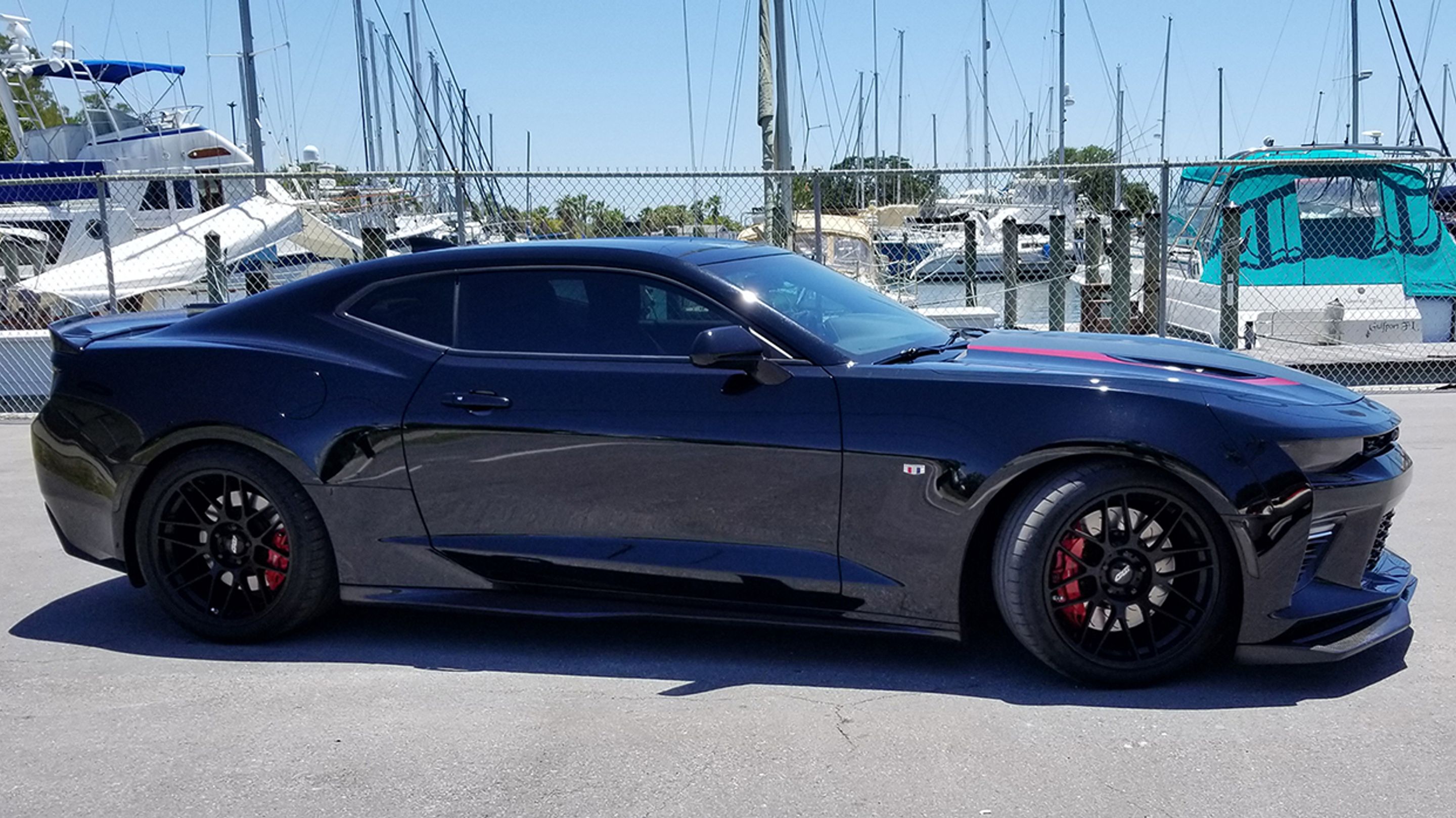 Black Chevrolet 6th Gen Camaro SS with 19" ARC-8 Apex wheels in Satin Black