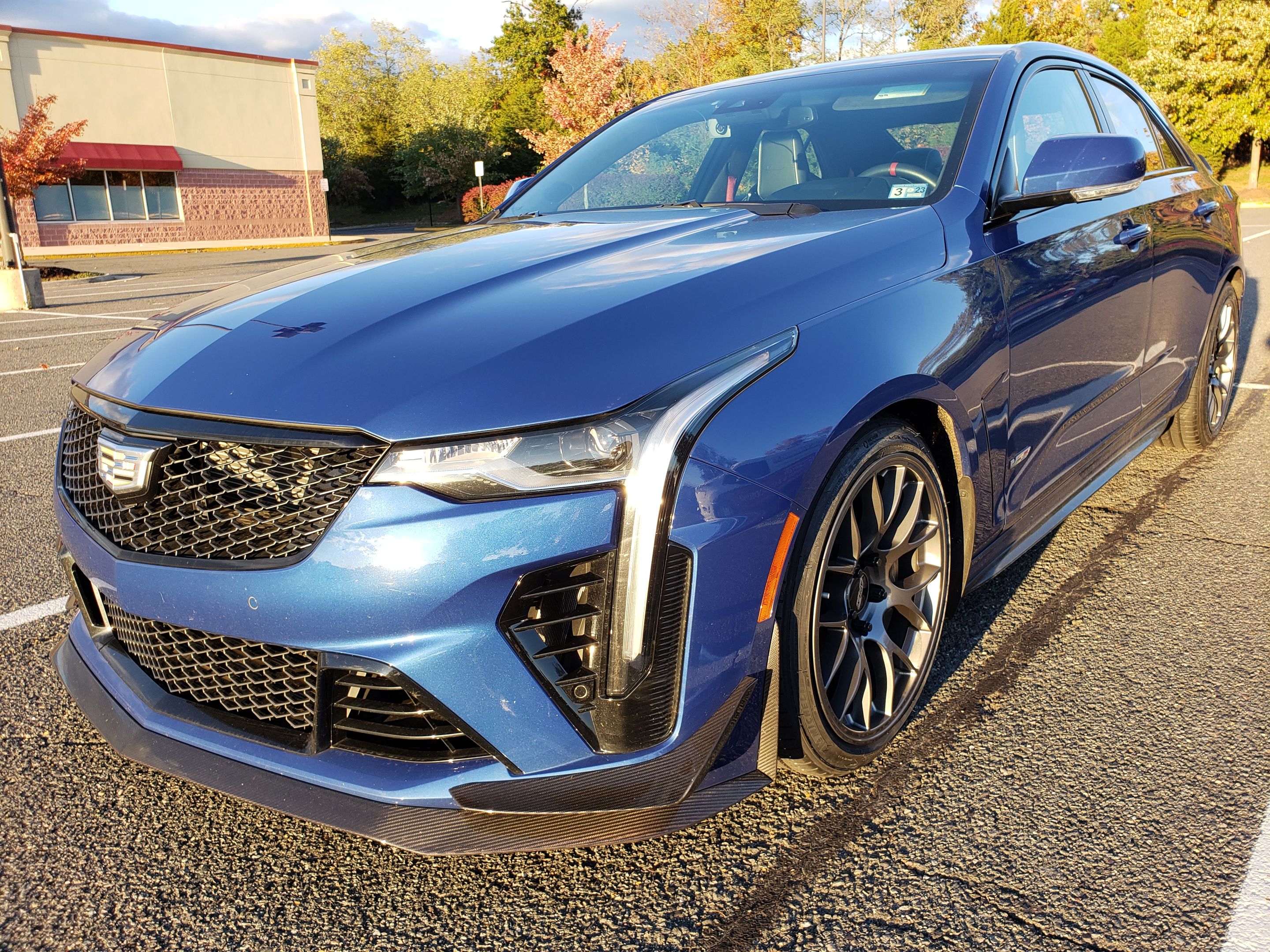Blue Cadillac CT4-V Blackwing with 18" EC-7 Apex wheels in Anthracite