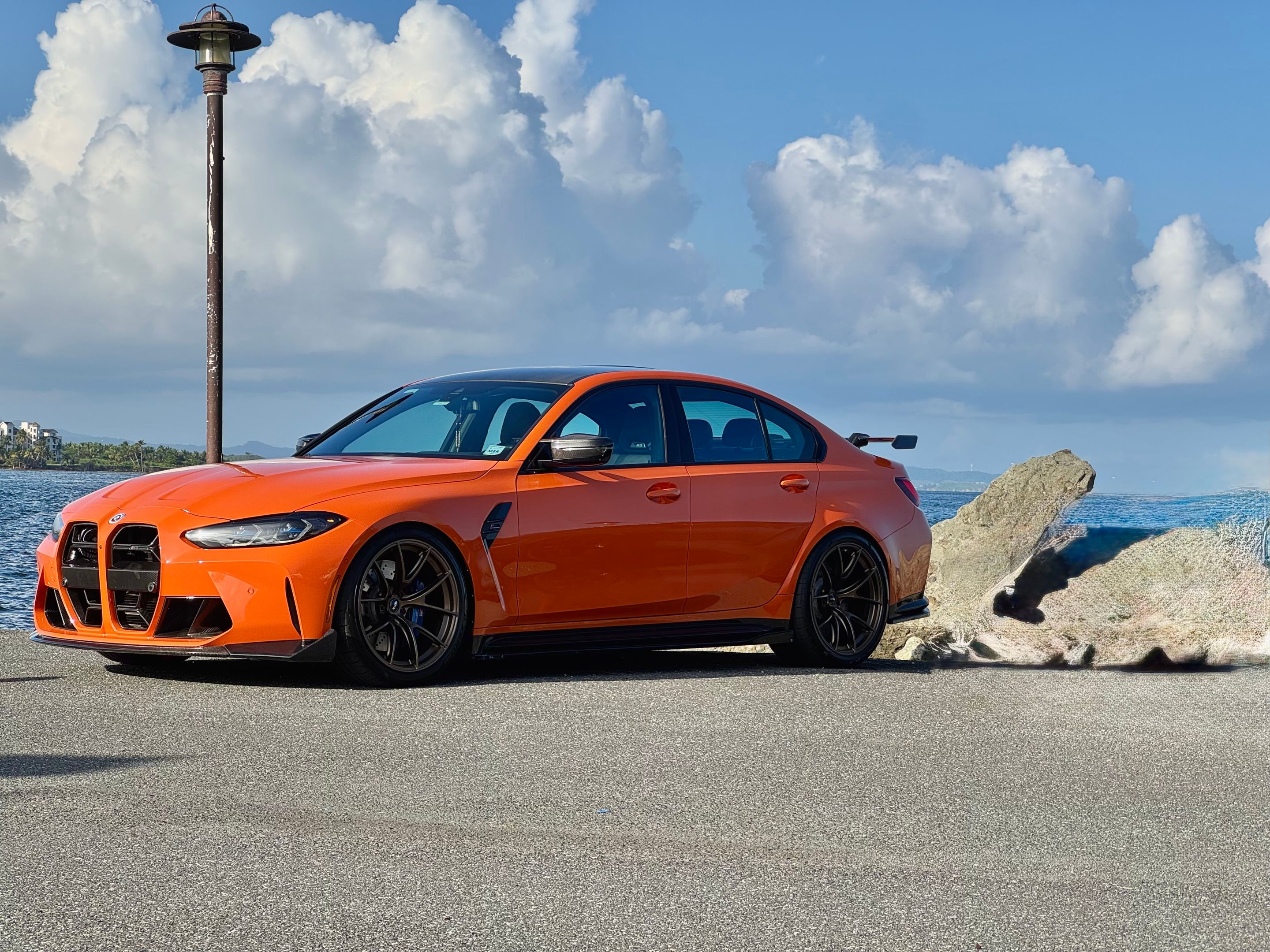 Orange BMW G80 M3 with 20" VS-5RS Apex wheels in Satin Bronze
