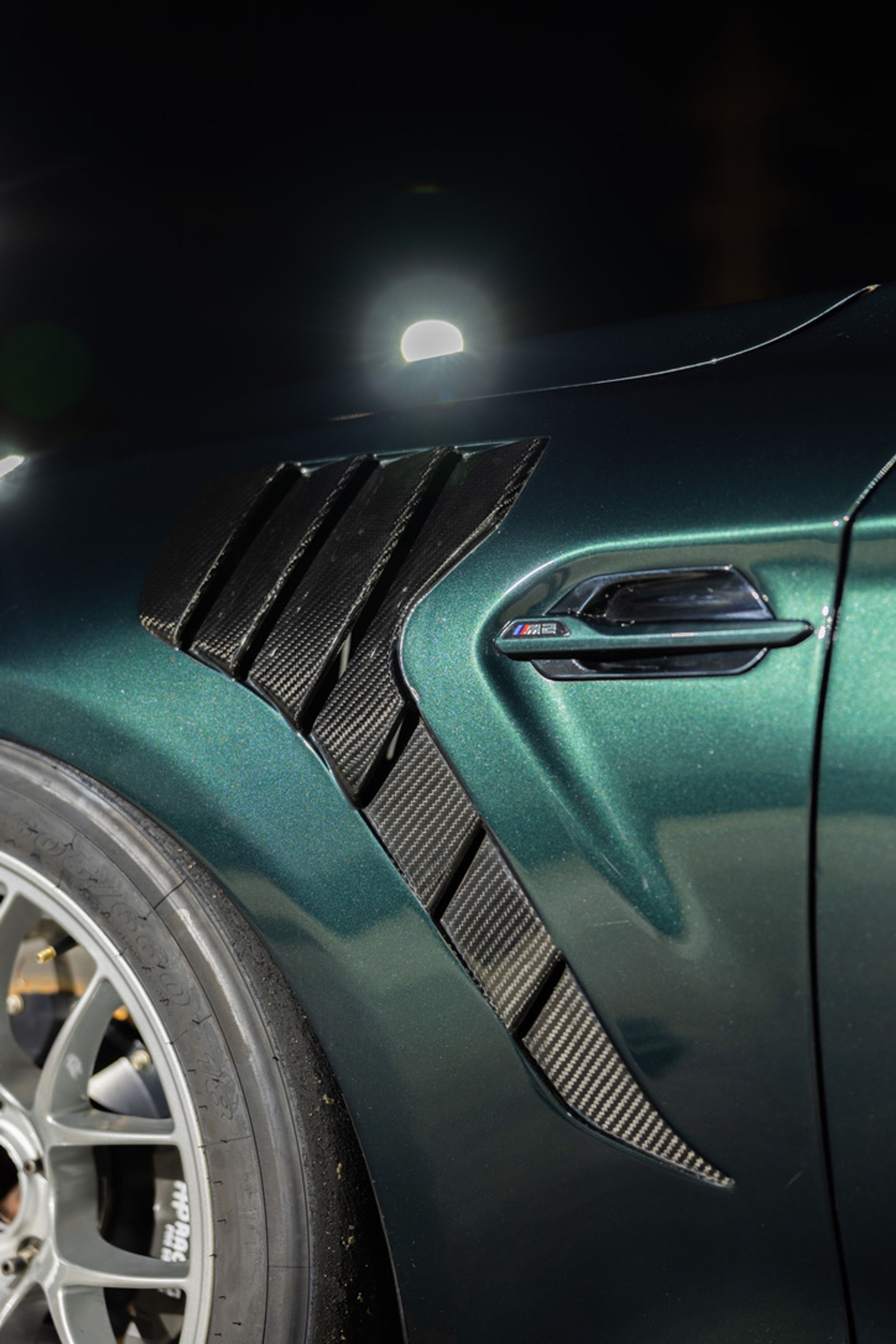 Green BMW F87 M2 with 18" EC-7 Apex wheels in Race Silver