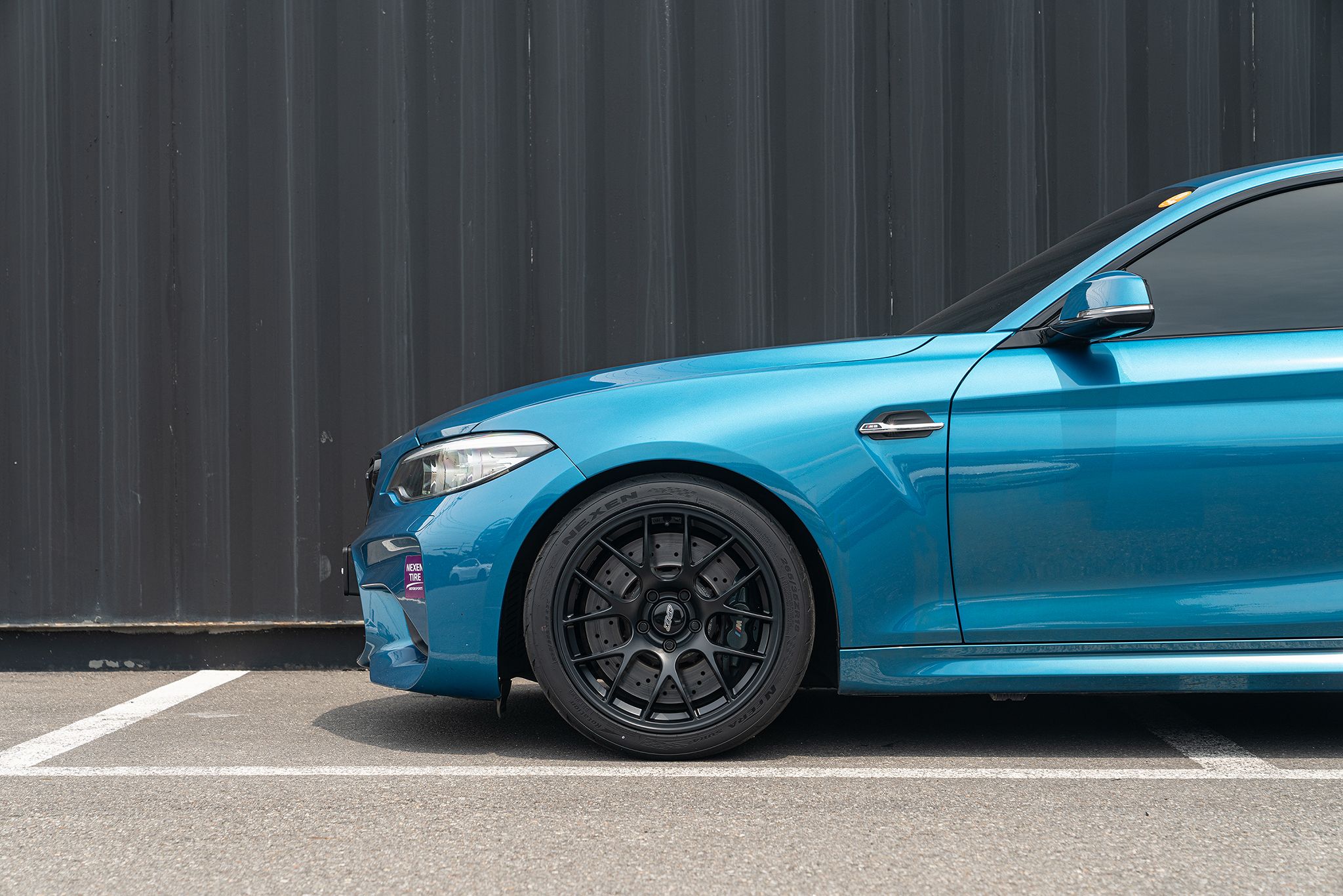 Blue BMW F87 M2 with 18" EC-7 Apex wheels in Satin Black