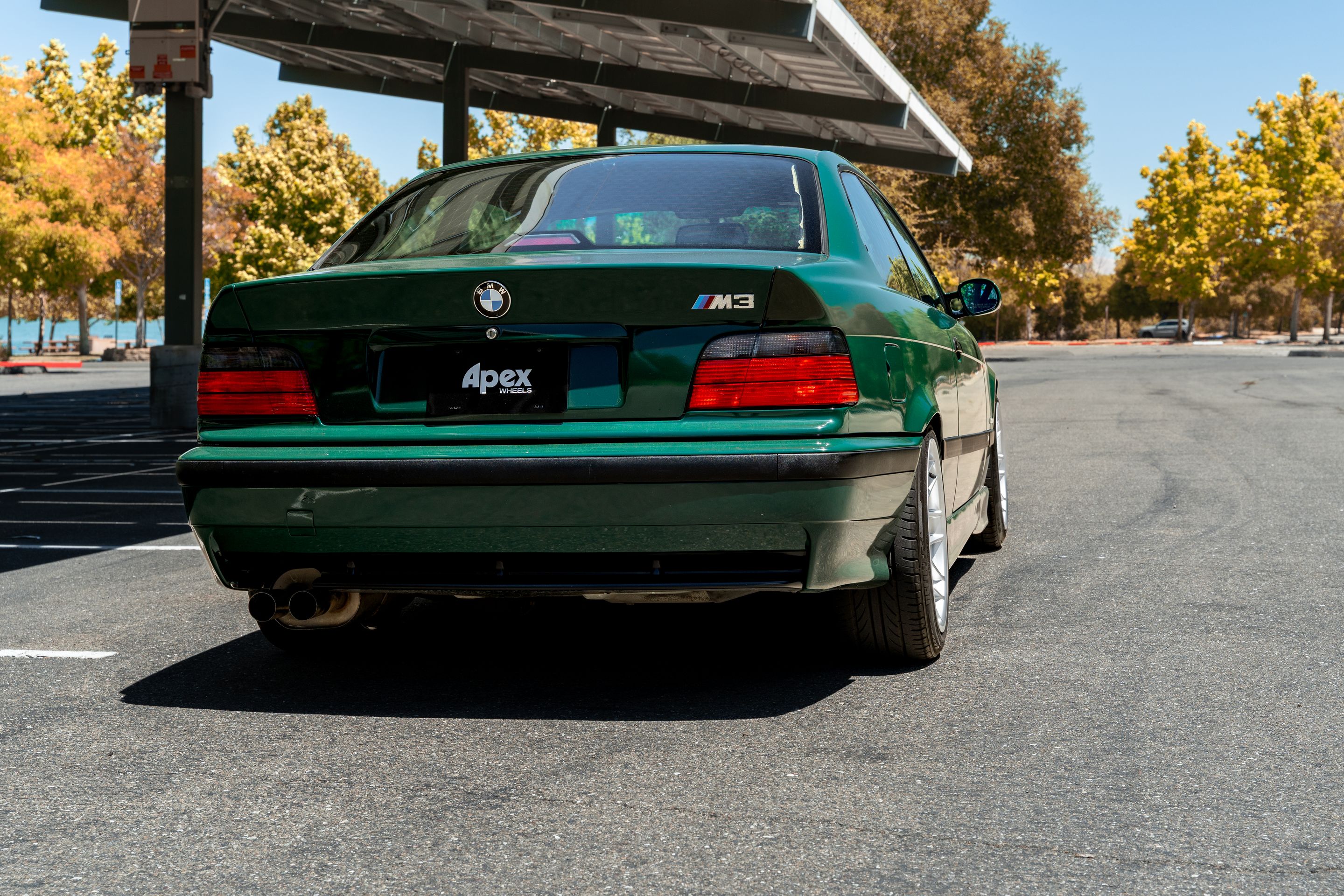 Green BMW E36 M3 with 17" ARC-8 Apex wheels in Race Silver