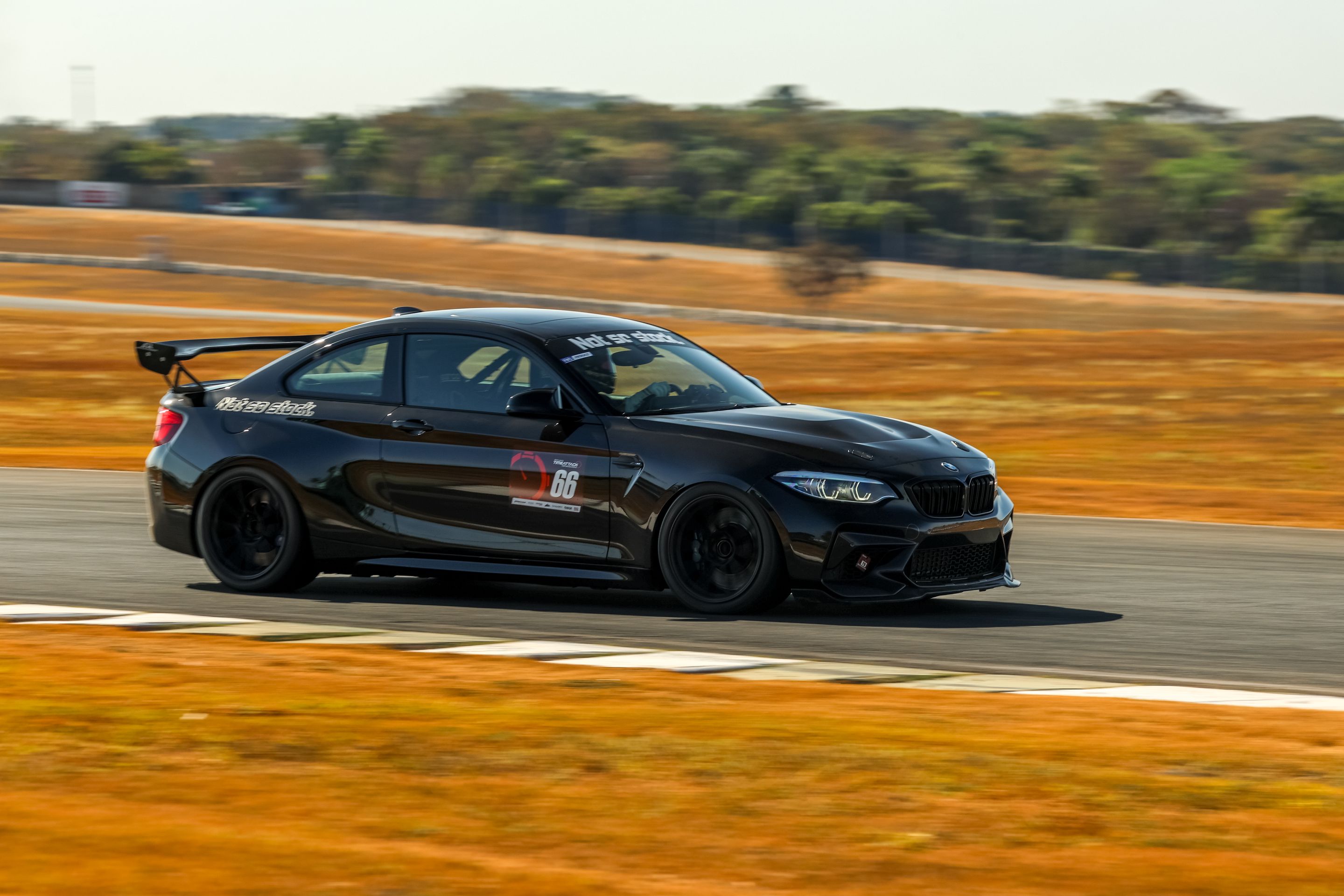 Black BMW F87 M2 with 18" SM-10RE Apex wheels in Anthracite
