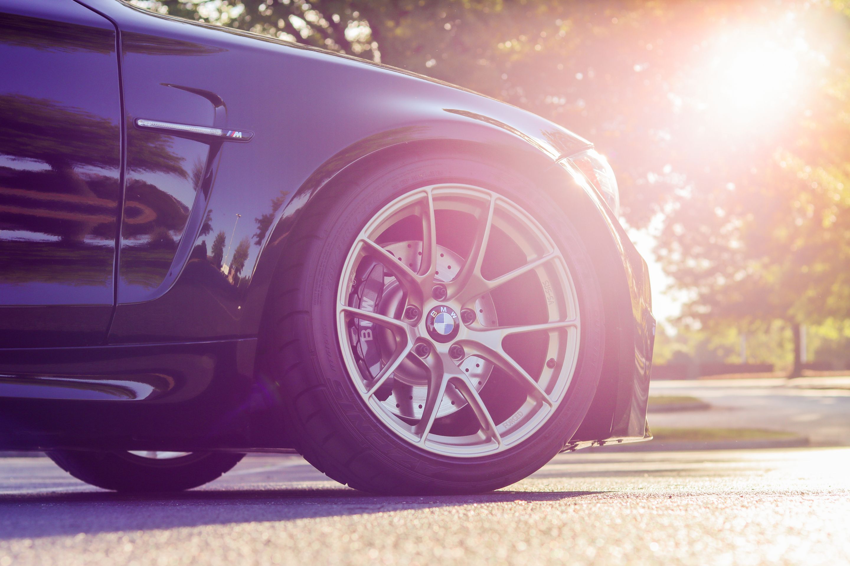 Black BMW E82 Coupe 1 Series with 18" VS-5RS Apex wheels in Motorsport Gold