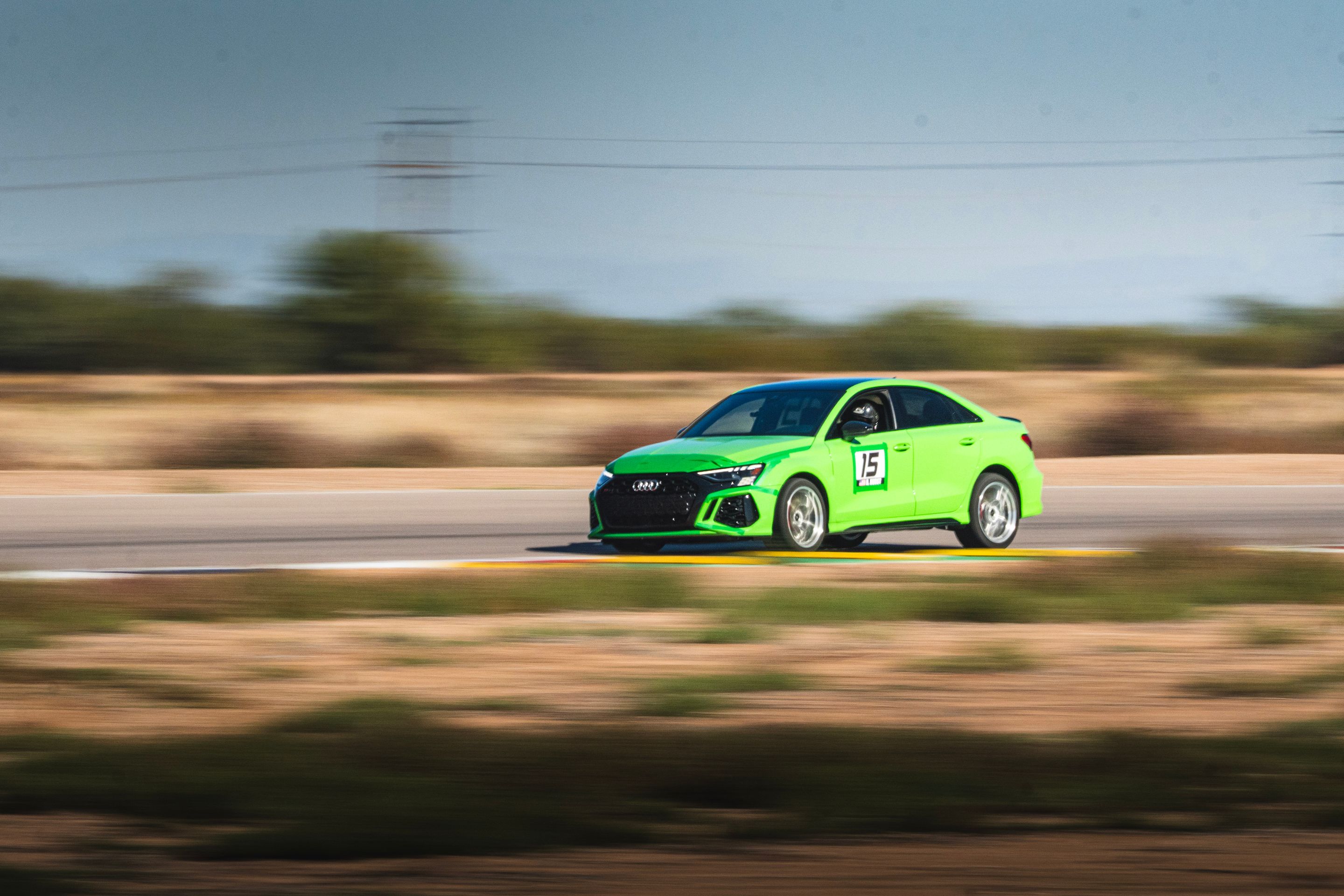 Green Audi 8Y RS 3 with 18" VS-5RS Apex wheels in Brushed Clear
