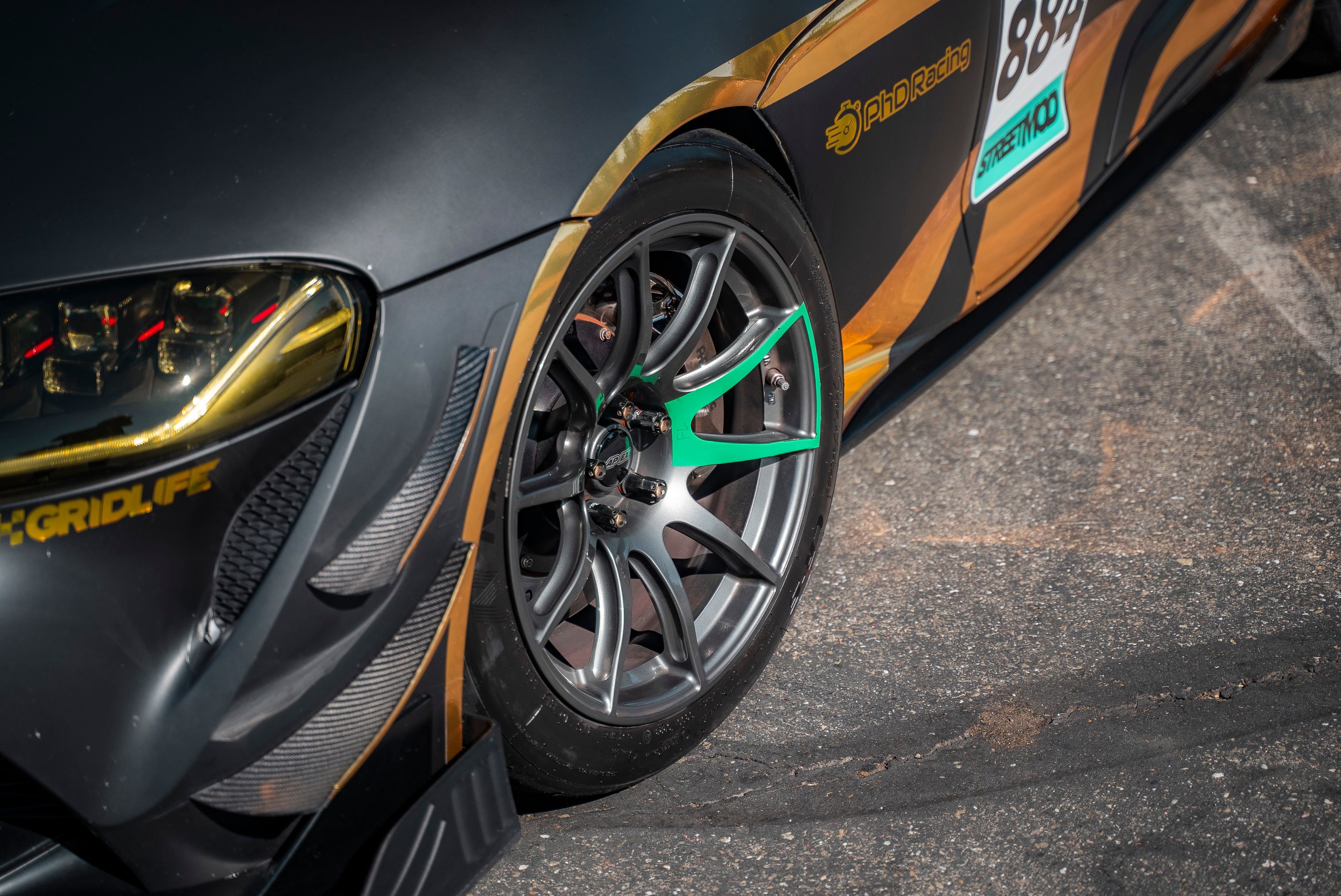 Grey Toyota GR Supra with 18" SM-10 Apex wheels in Anthracite