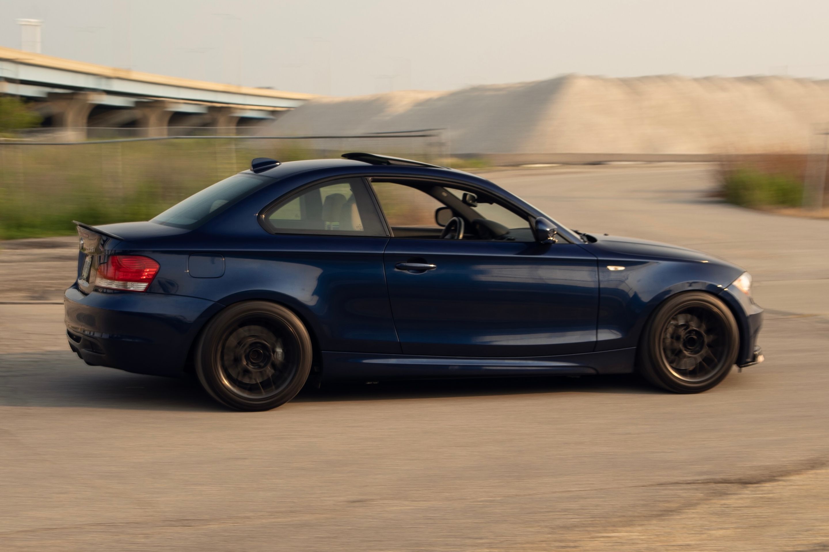 Blue BMW E82 Coupe 1 Series with 17" ARC-8 Apex wheels in Satin Black