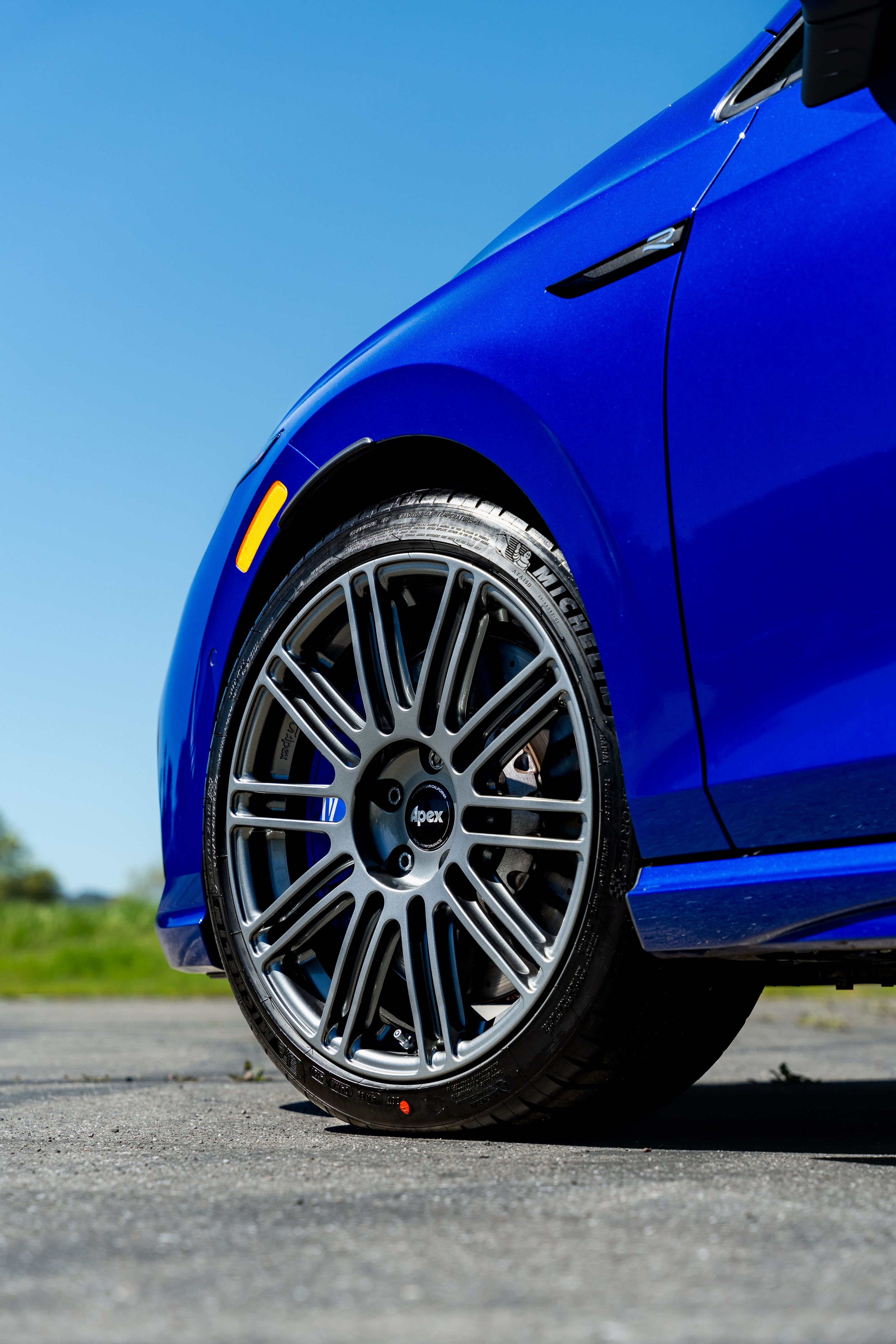 Blue VW MK8 Golf R with 18" TC-10RT Apex wheels in Anthracite