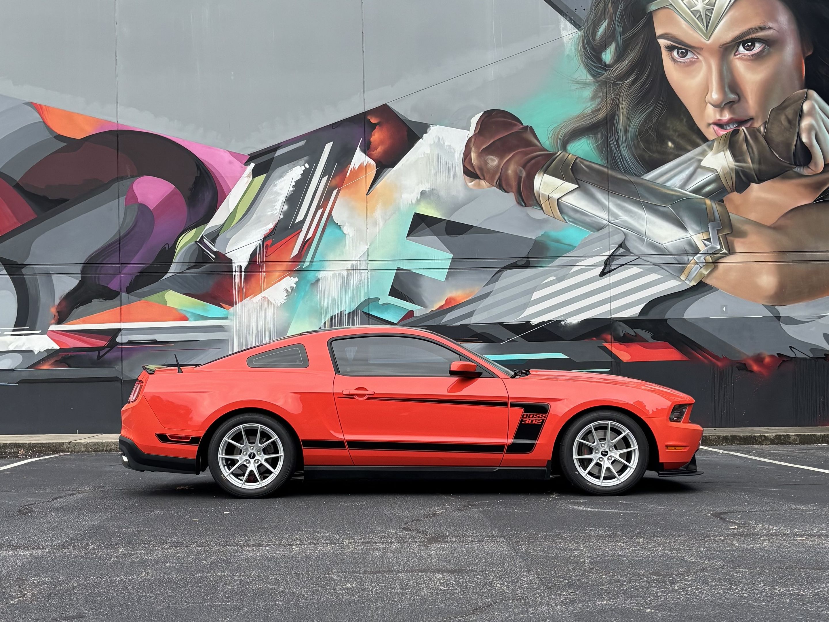 Red Ford S197 Mustang Boss 302 with 18" VS-5 Apex wheels in Race Silver