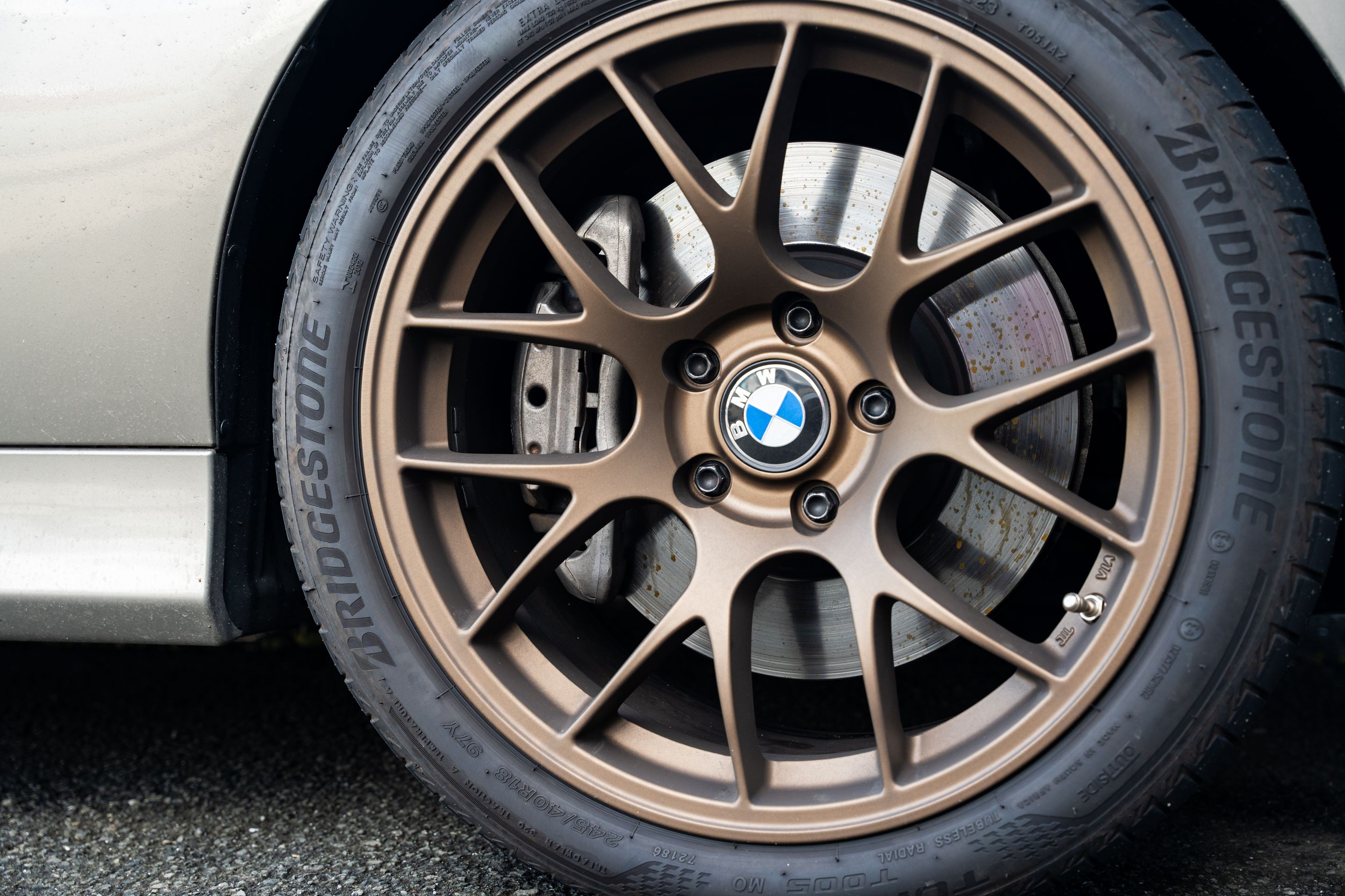 Silver BMW E90 Sedan 3 Series with 18" EC-7 Apex wheels in Satin Bronze