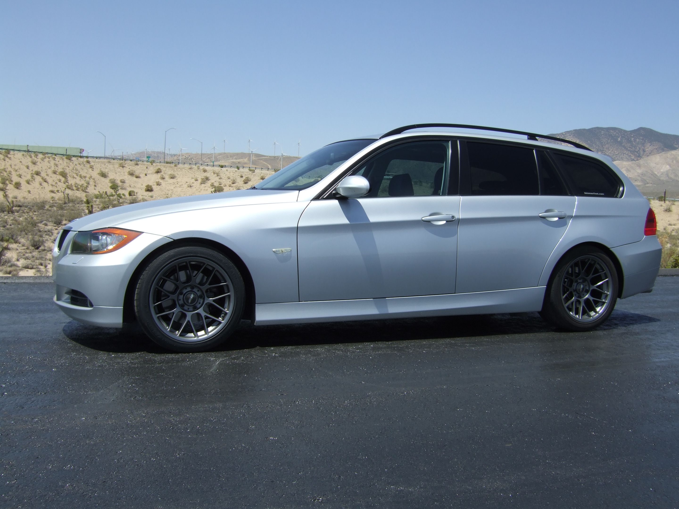 Silver BMW E91 Wagon 3 Series with 17" ARC-8 Apex wheels in Anthracite