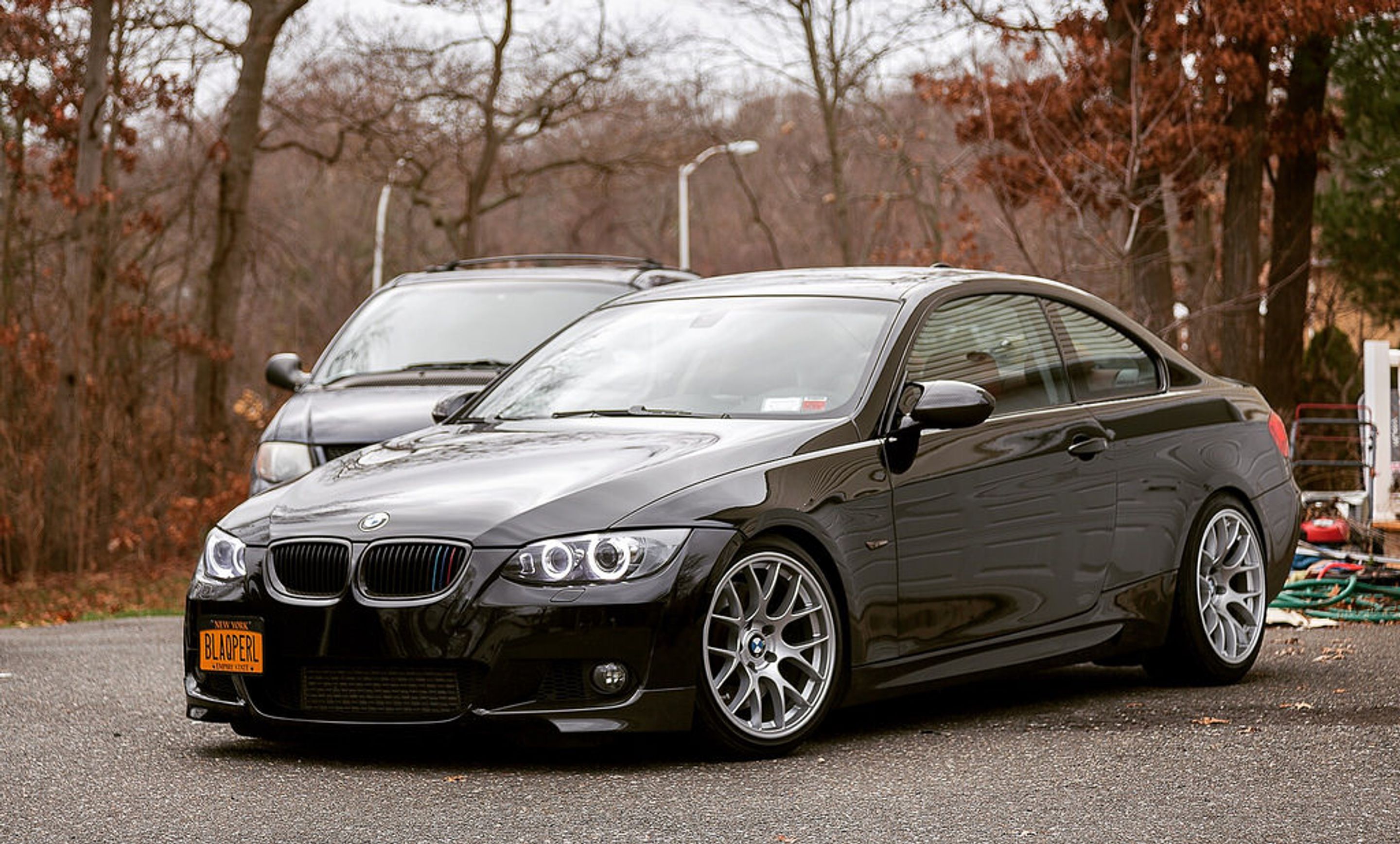 Black BMW E92 Coupe 3 Series with 18" EC-7 Apex wheels in Race Silver