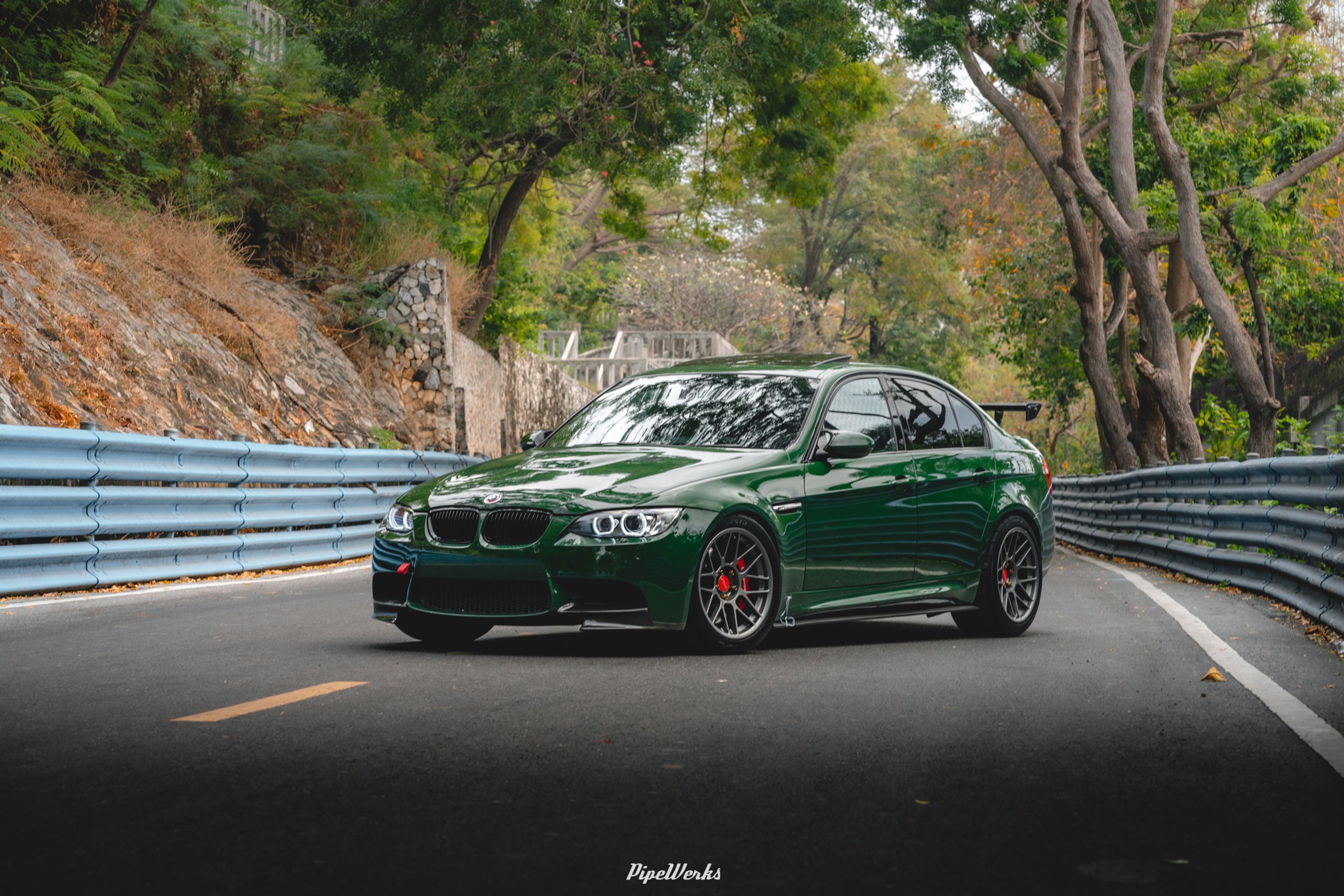 Green BMW E90 Sedan 3 Series with 18" ARC-8 Apex wheels in Anthracite