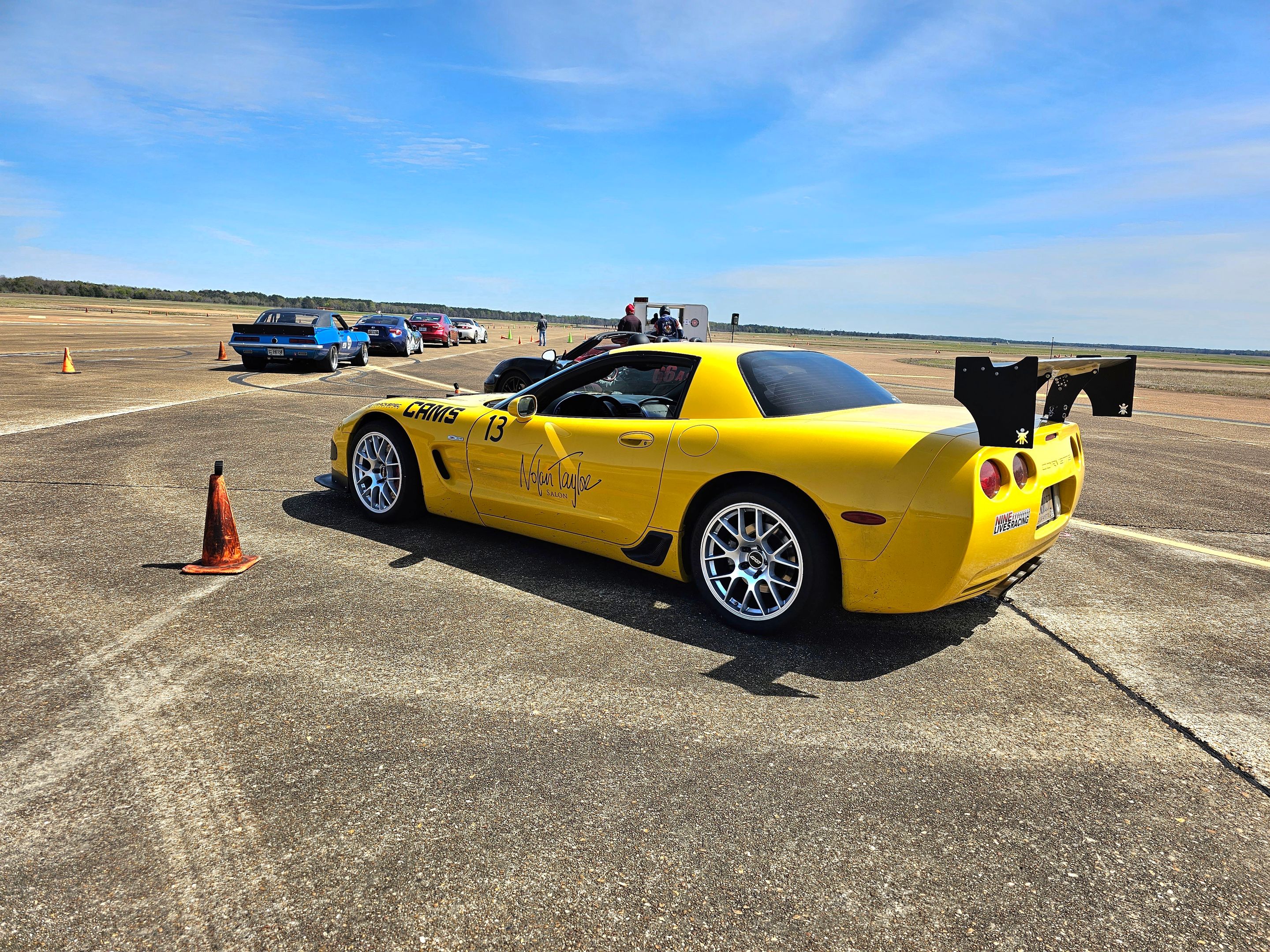 Yellow Chevrolet C5 Corvette Z06 with 18" EC-7 Apex wheels in Race Silver