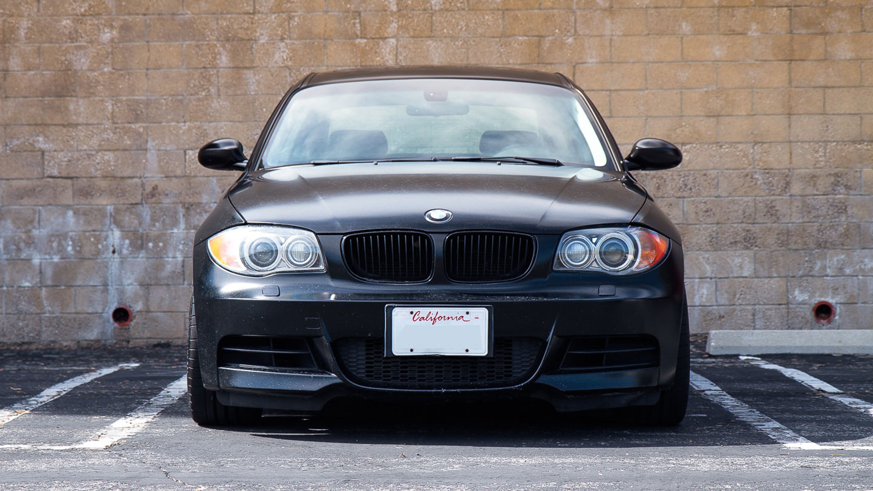 Black BMW E82 Coupe 1 Series with 18" EC-7 Apex wheels in Anthracite