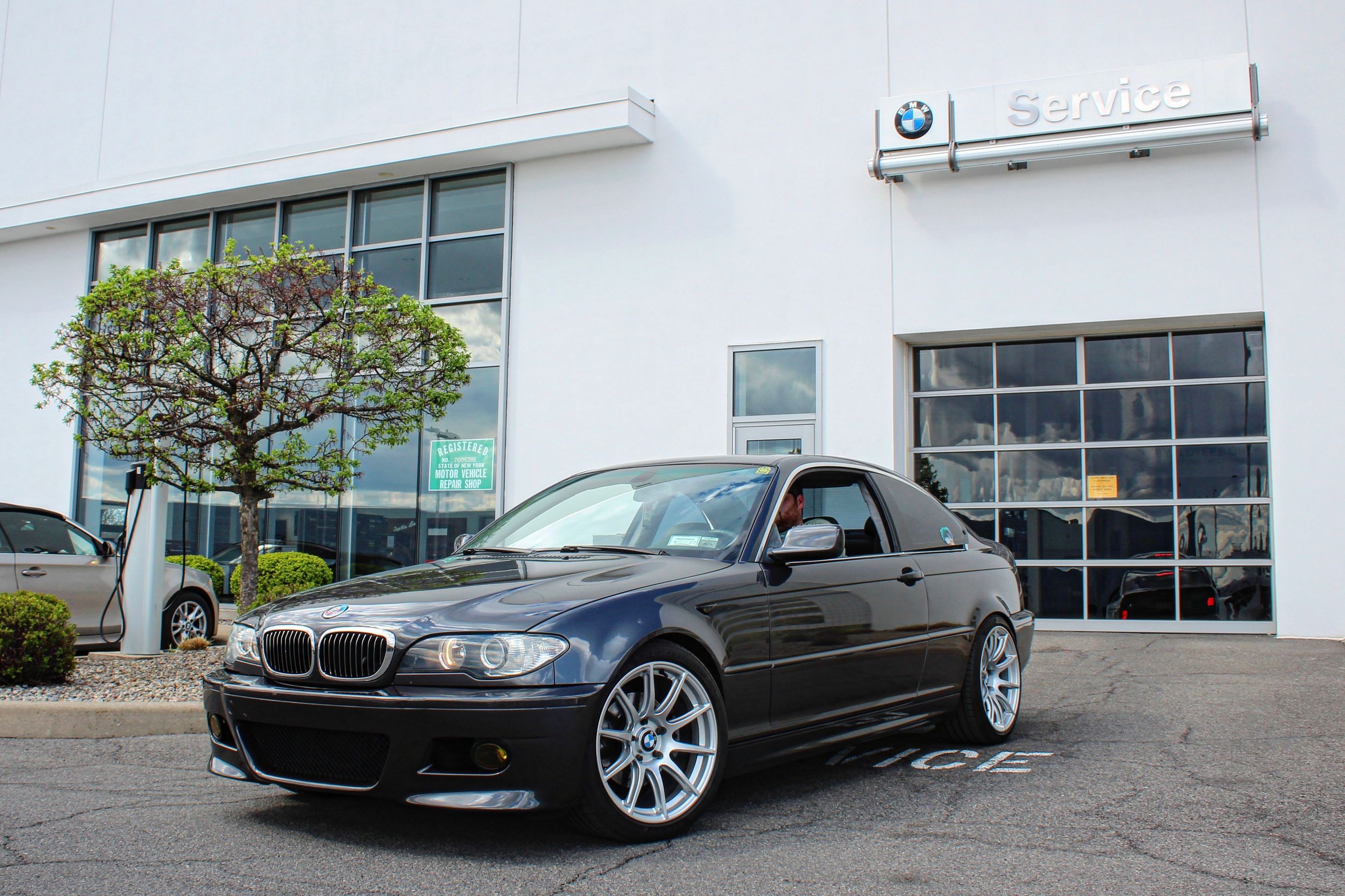 Black BMW E46 3 Series with 18" SM-10 Apex wheels in Race Silver