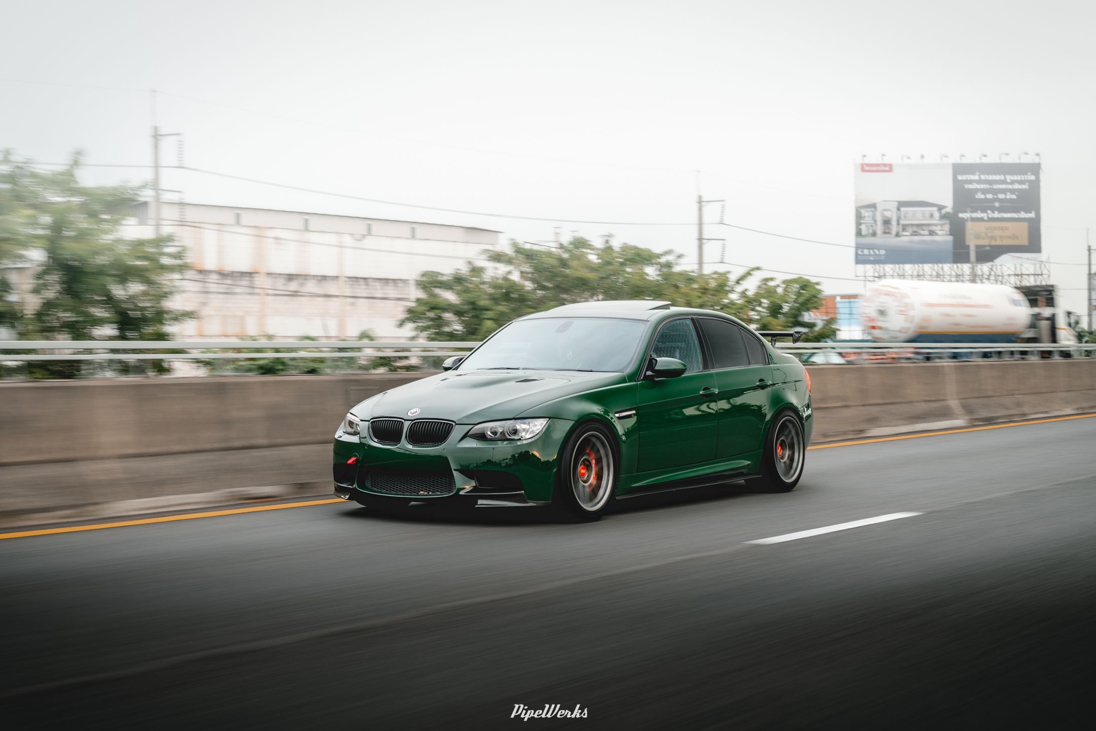 Green BMW E90 Sedan 3 Series with 18" ARC-8 Apex wheels in Anthracite