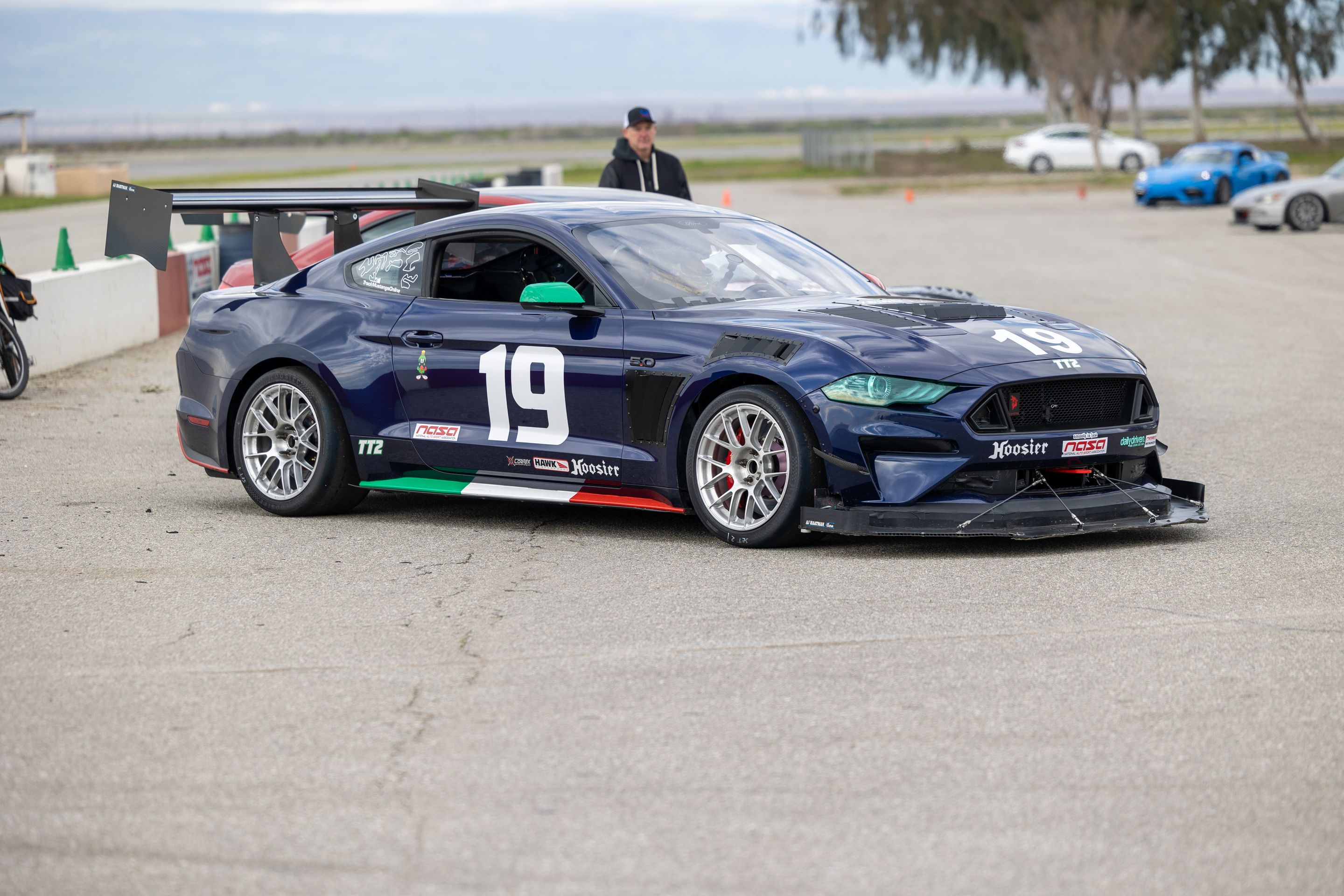 Blue Ford S550 Mustang GT with 18" EC-7RS Apex wheels in Brushed Clear