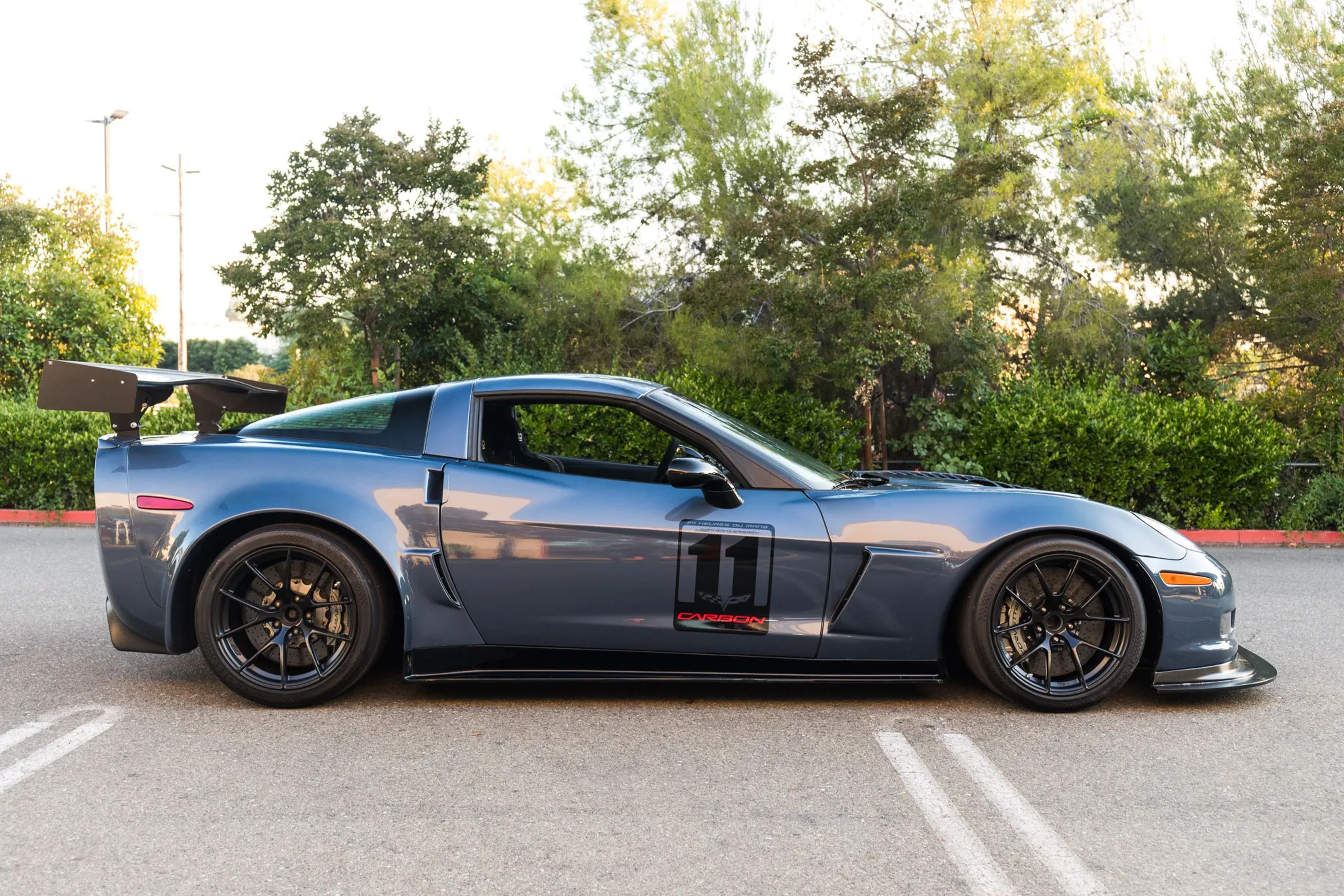 Blue Chevrolet C6 Corvette Z06 with 18" VS-5RS Apex wheels in Satin Black