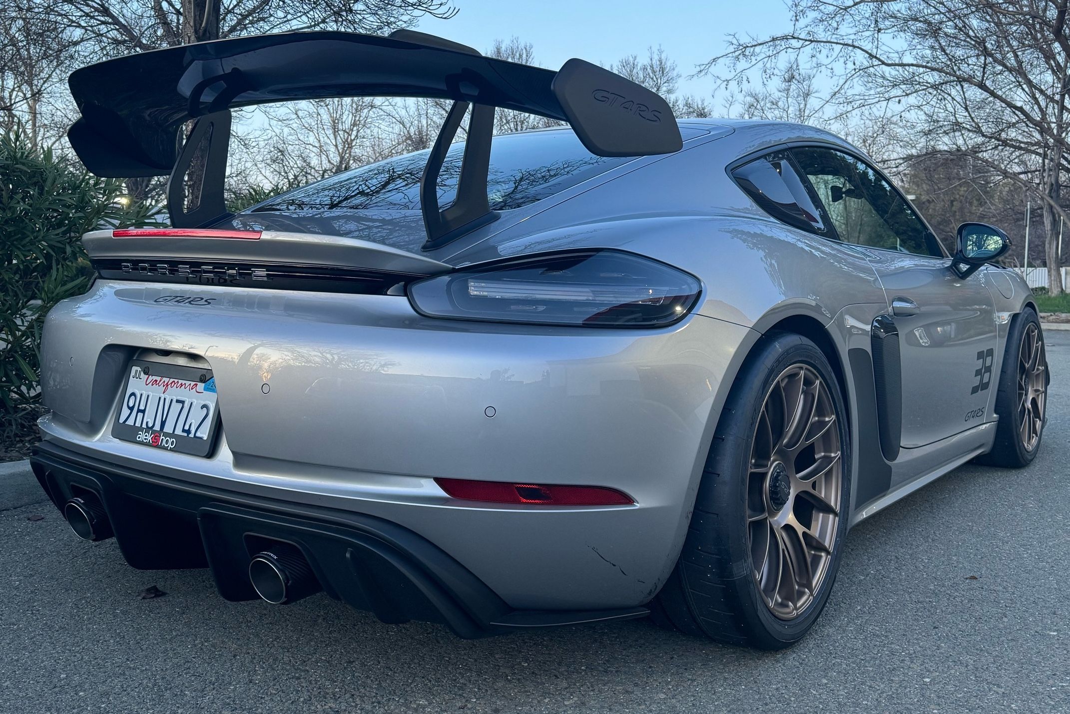 Silver Porsche 718 Cayman GT4 RS with 19" EC-7RS Apex wheels in Custom Finish