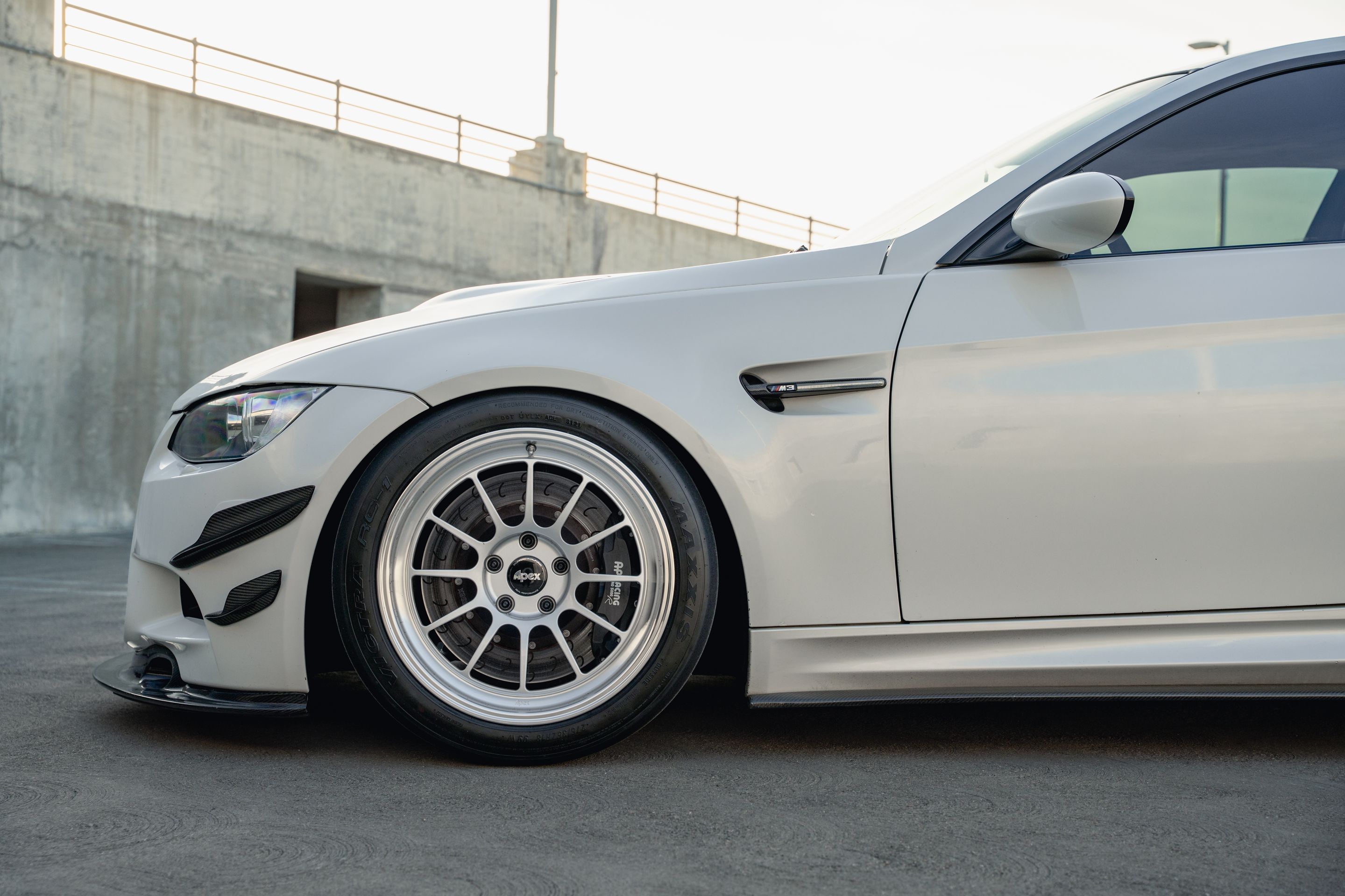 White BMW E92 Coupe M3 with 18" SL-12 Apex wheels in Machined Lip Race Silver