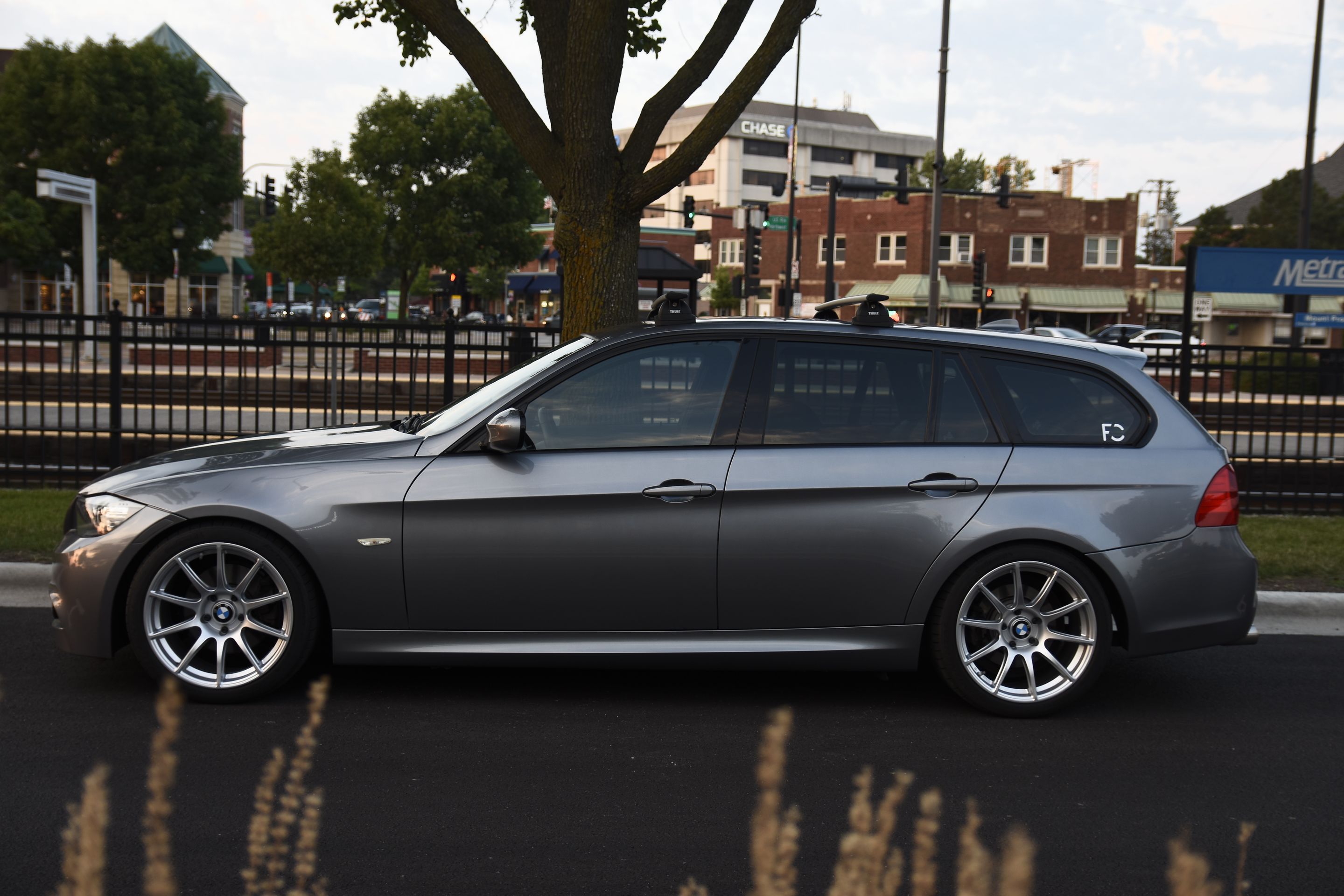 Grey BMW E91 LCI Wagon 3 Series with 18" SM-10 Apex wheels in Race Silver