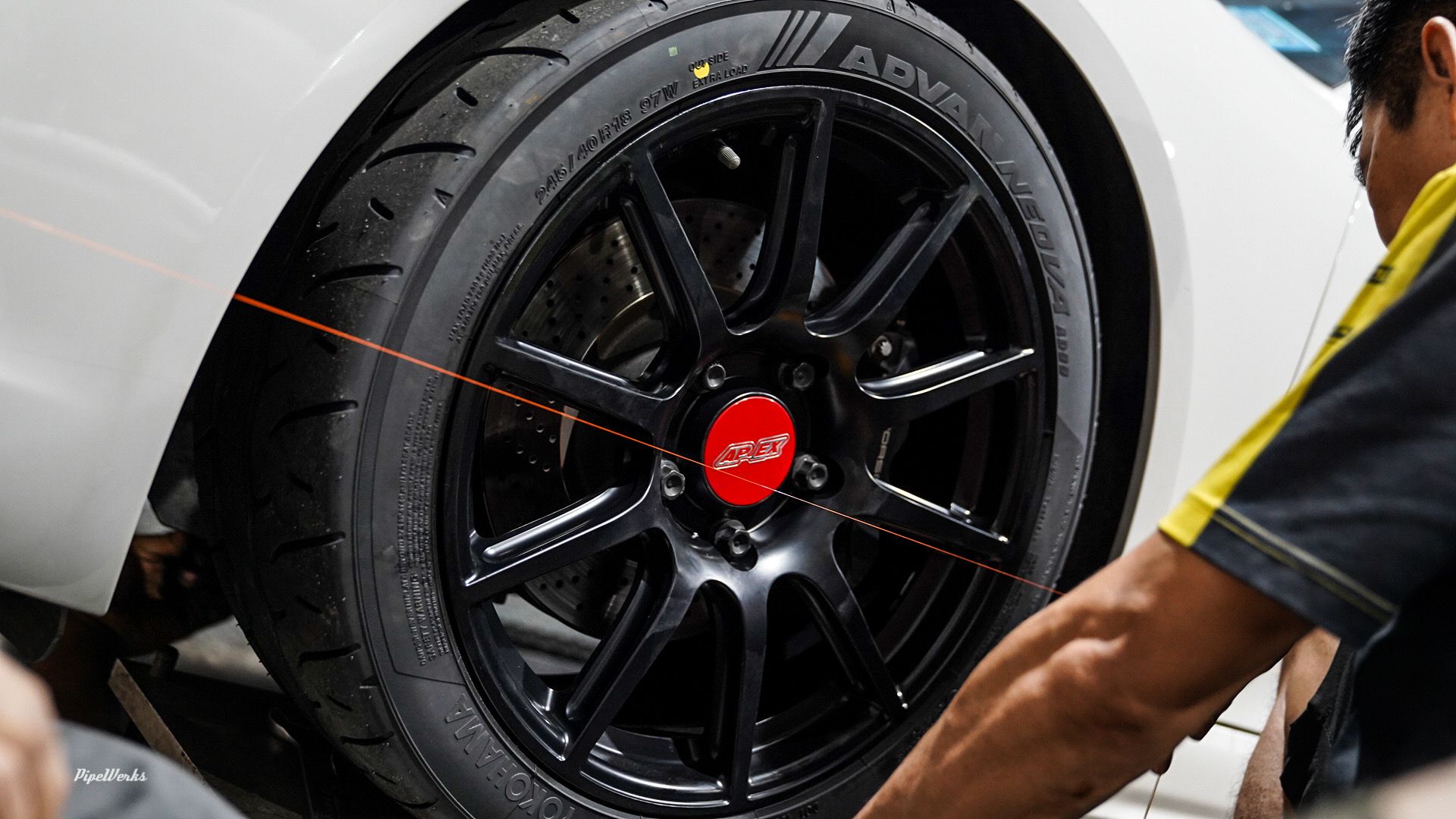 White Porsche 718 Cayman Base with 18" SM-10 Apex wheels in Satin Black