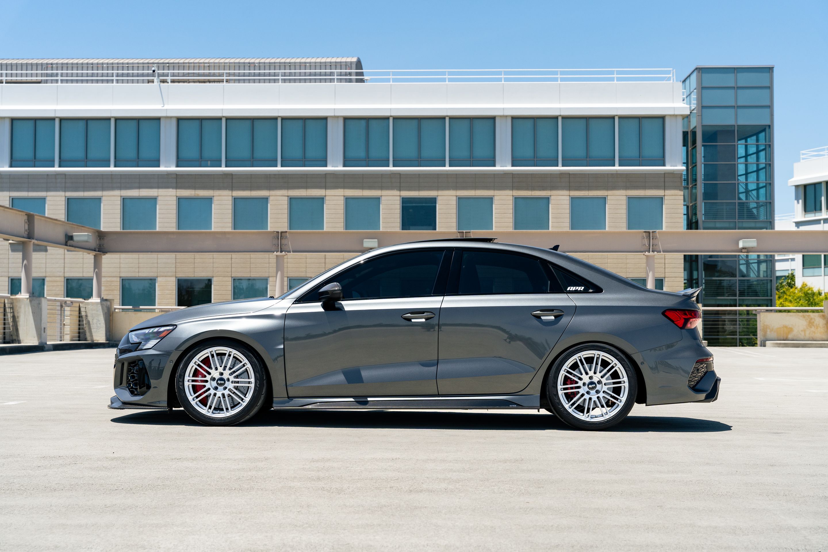Grey Audi 8Y RS 3 with 18" TC-10RT Apex wheels in Race Silver