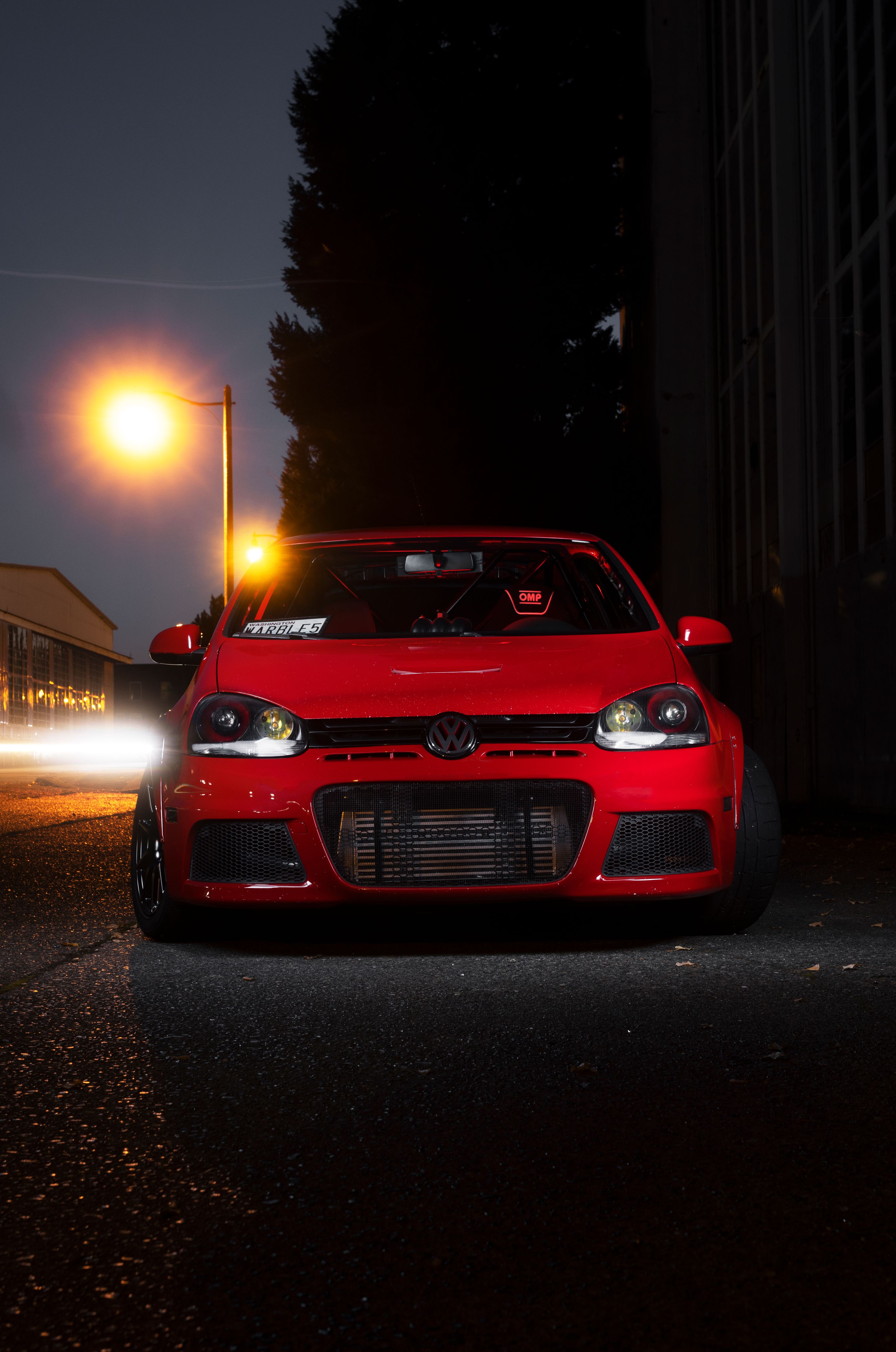Red VW MK5 Golf with 17" SM-10 Apex wheels in Satin Black