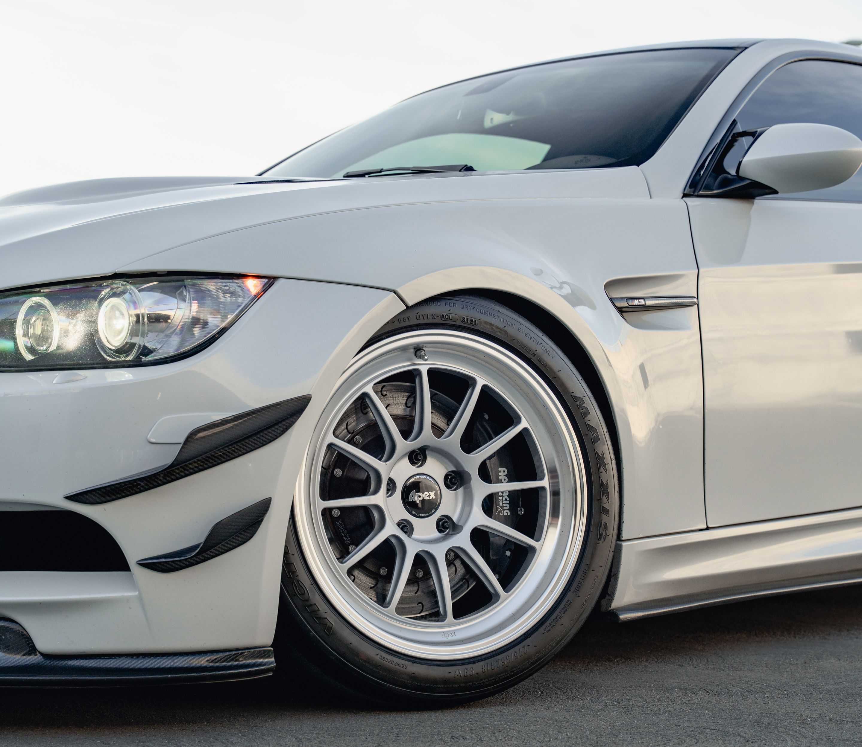 White BMW E92 Coupe M3 with 18" SL-12 Apex wheels in Machined Lip Race Silver