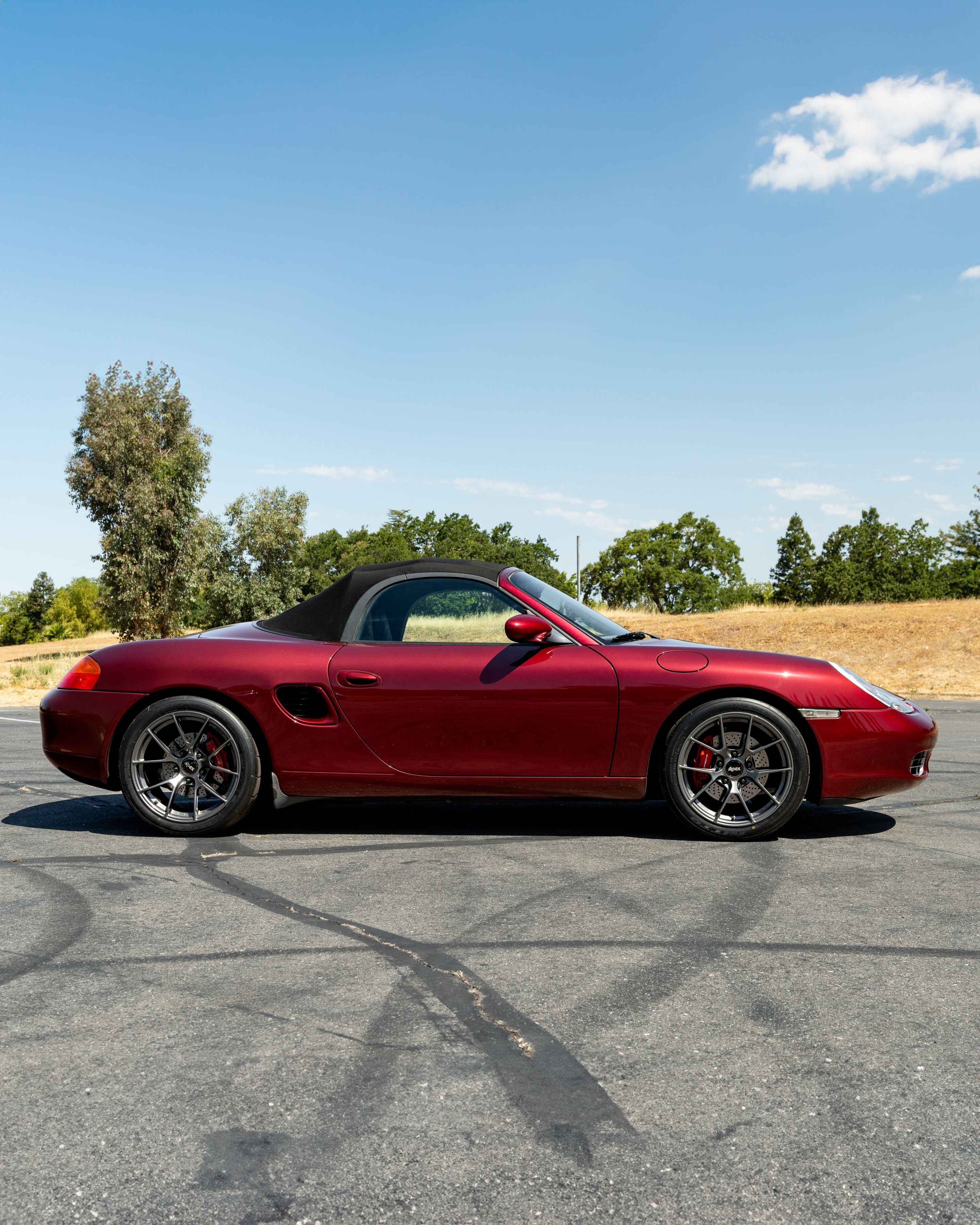 Red Porsche 986 Boxster with 18" VS-5RS Apex wheels in Anthracite