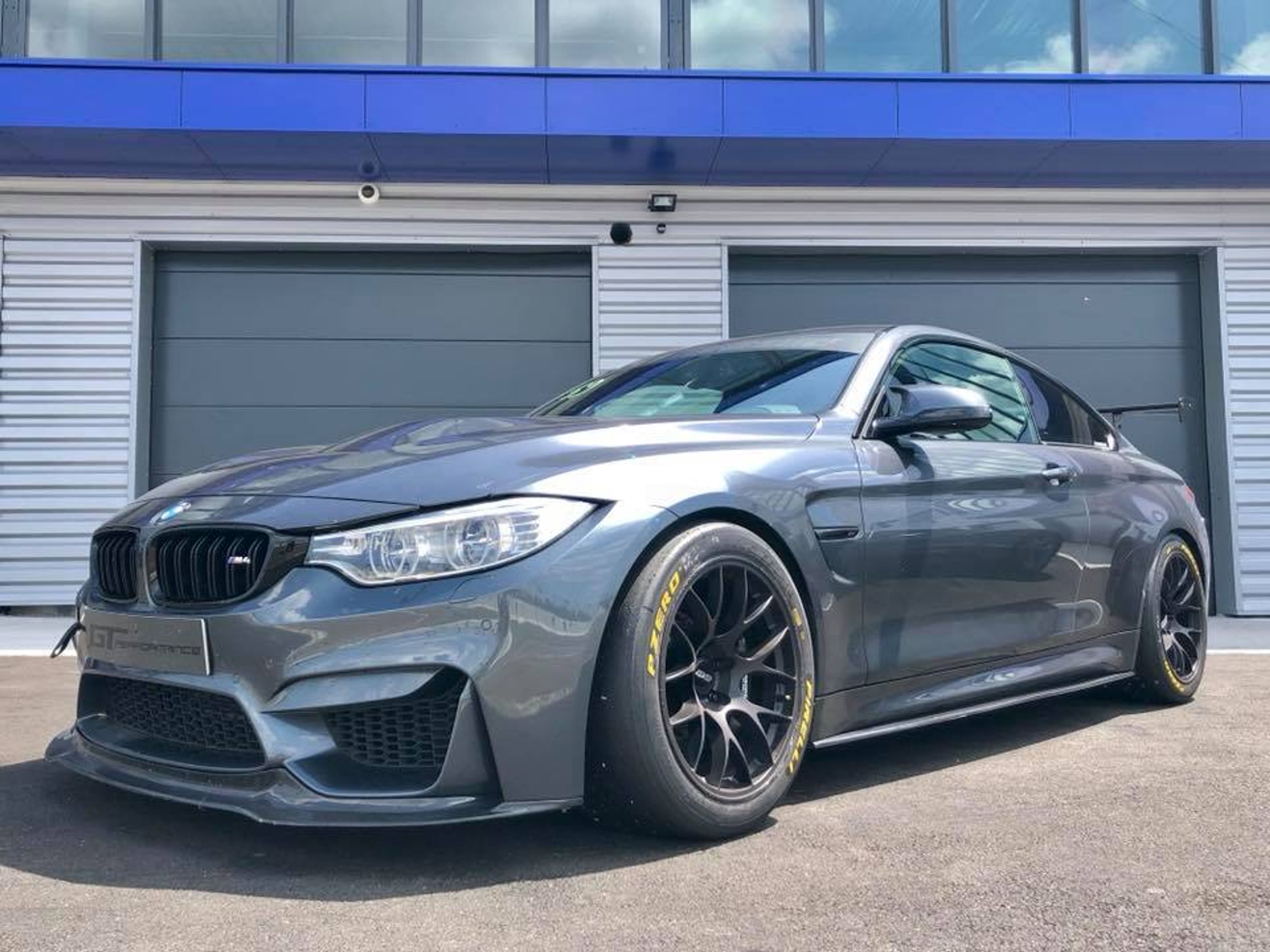 Grey BMW F82 Coupe M4 with 18" EC-7 Apex wheels in Satin Black