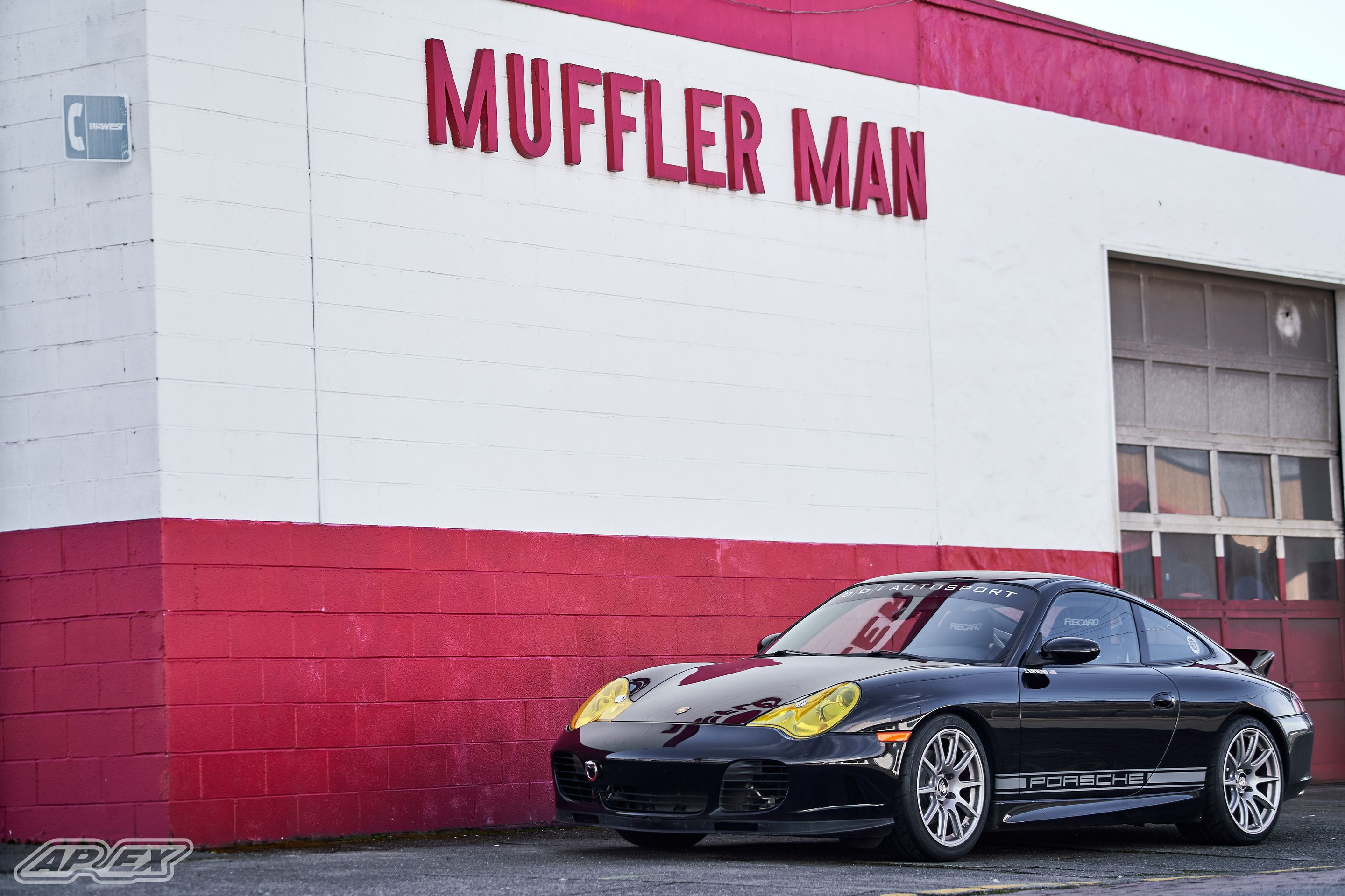 Black Porsche 911 996 Carrera with 18" SM-10 Apex wheels in Race Silver