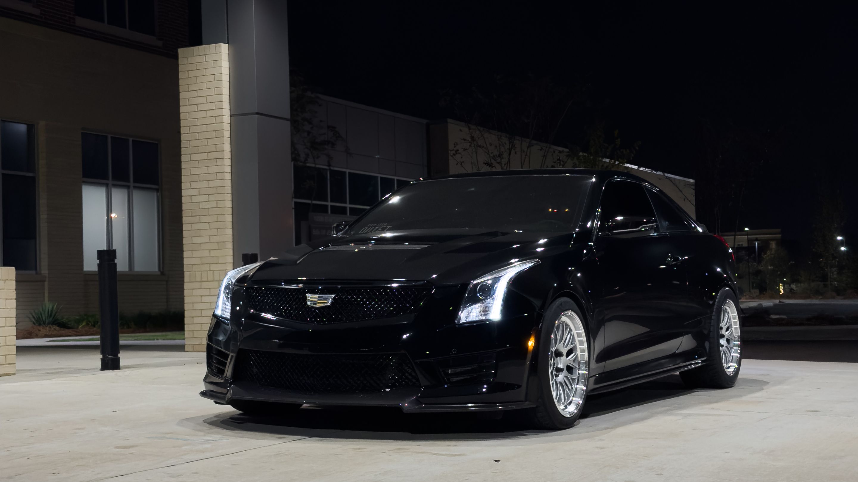 Black Cadillac ATS-V with 18" ML-10RT Apex wheels in Machined Lip Race Silver