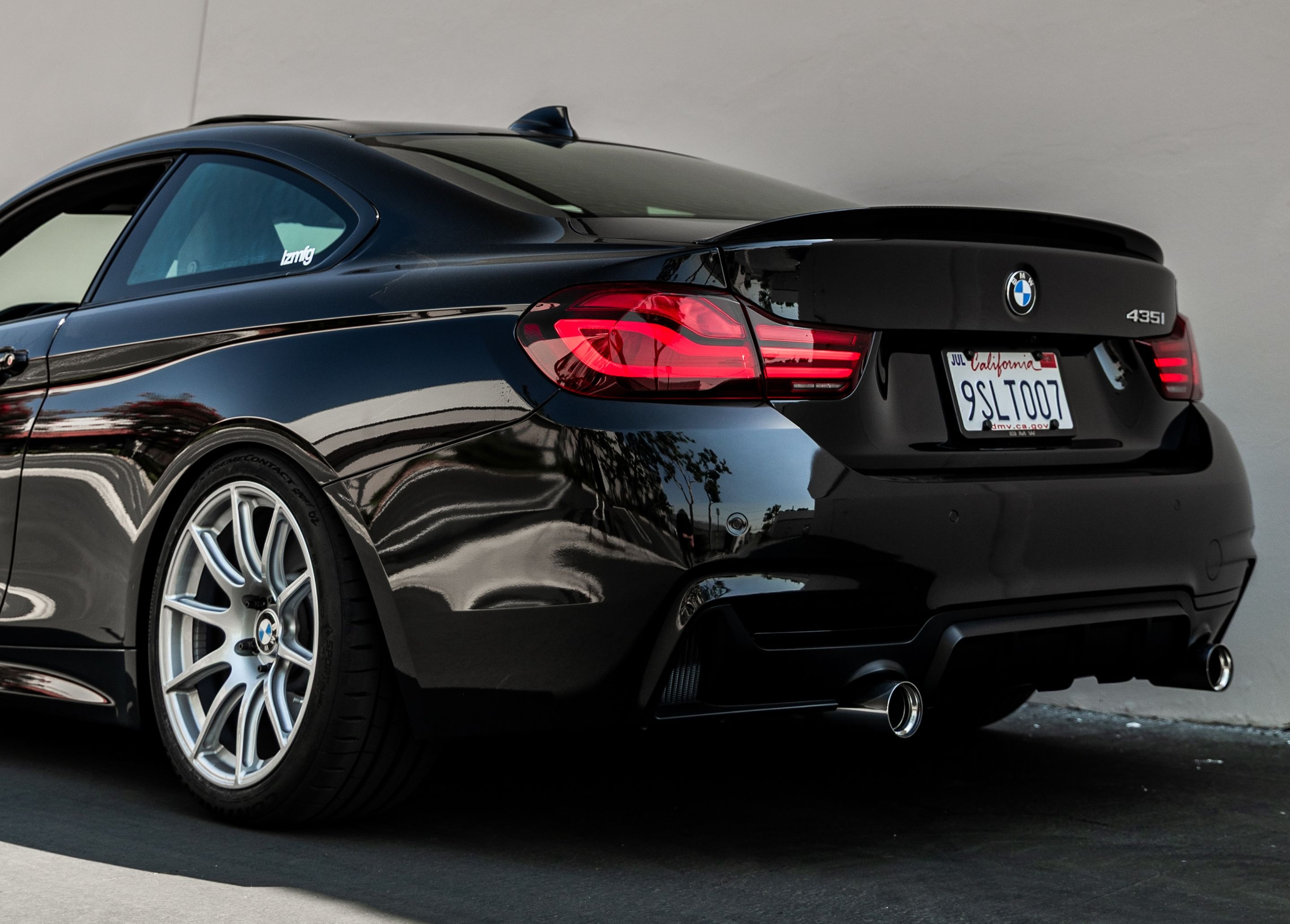 Black BMW F32 Coupe 4 Series with 18" SM-10 Apex wheels in Race Silver