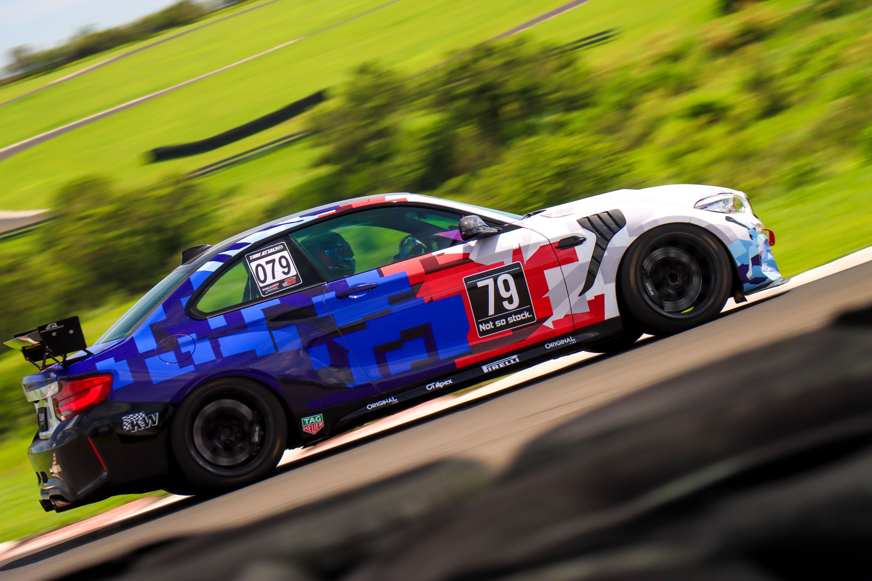 Multicolor BMW F87 M2 with 18" EC-7 Apex wheels in Satin Black