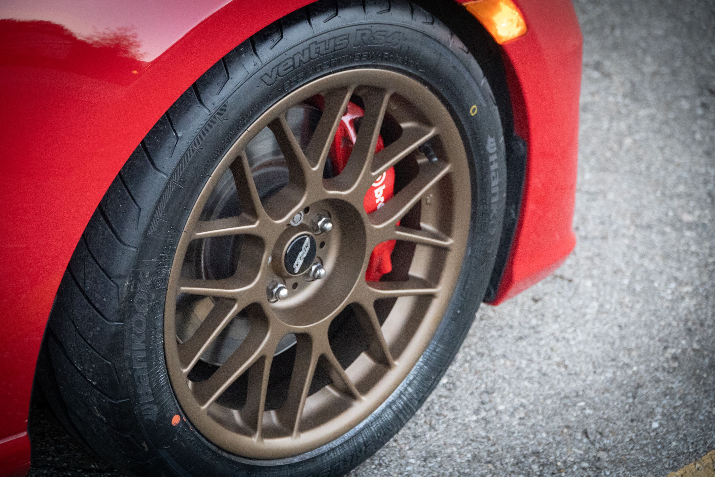 Red Subaru ZC6 / Gen 1 BRZ with 17" ARC-8 Apex wheels in Satin Bronze