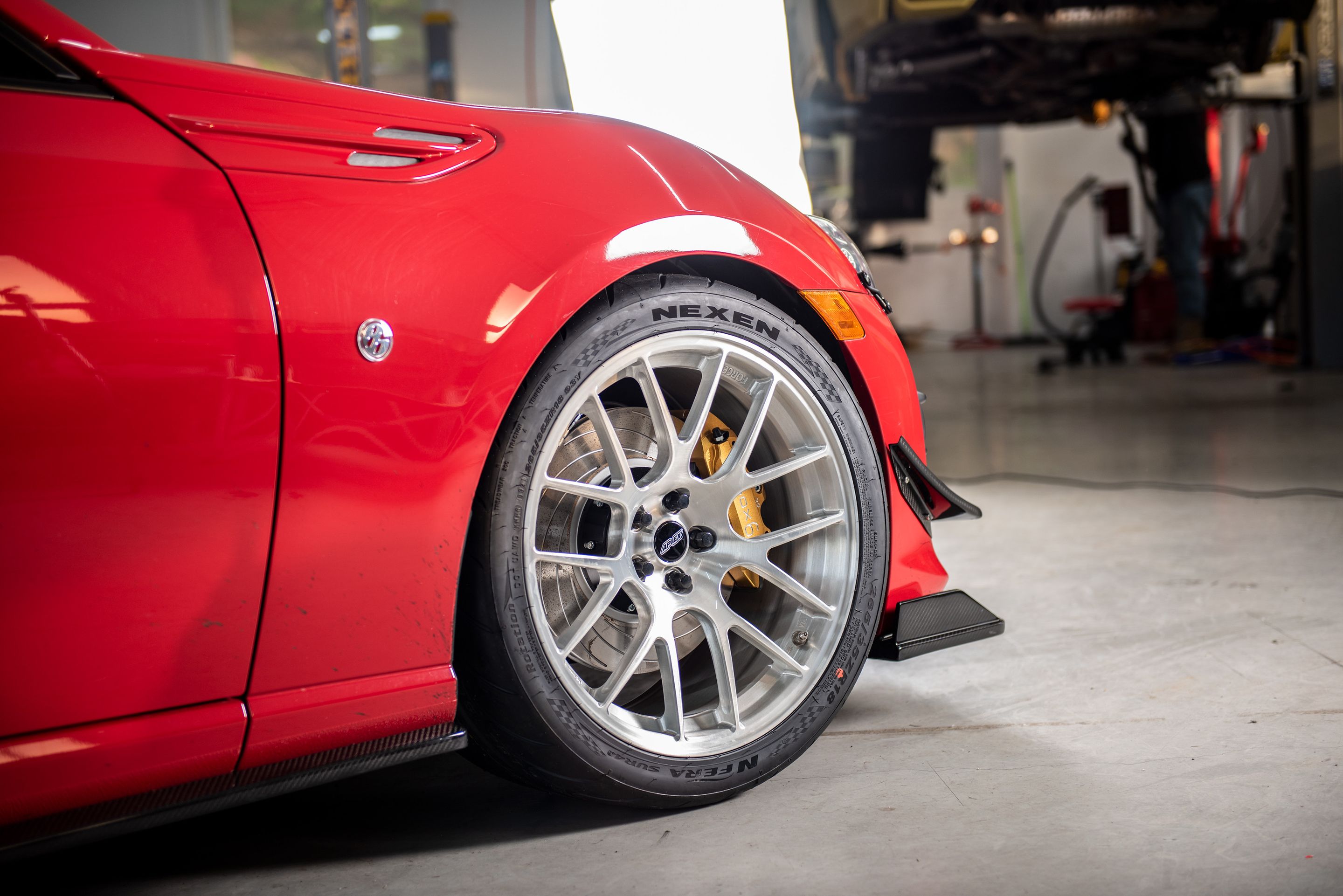 Red Toyota 86 / GT86 / FT86 with 18" EC-7R Apex wheels in Brushed Clear