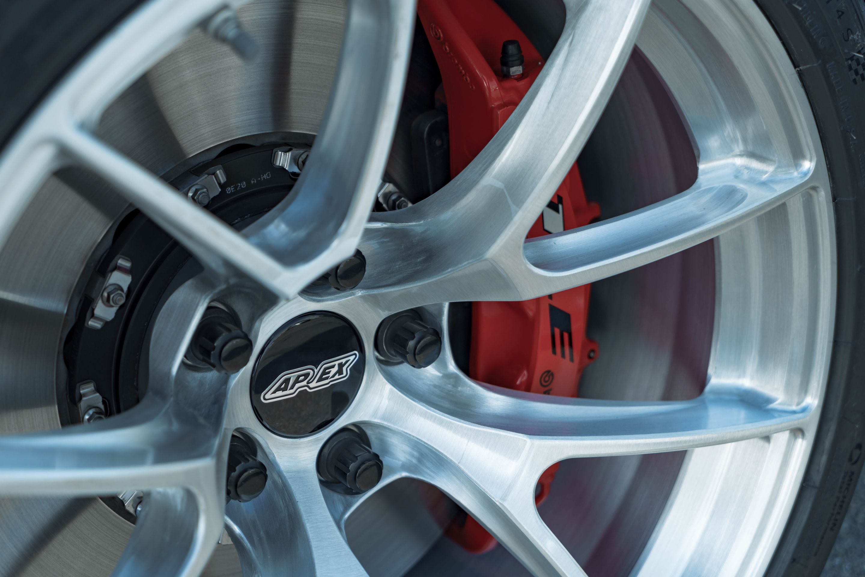 Blue Chevrolet 6th Gen Camaro ZL1 1LE with 19" VS-5RS Apex wheels in Brushed Clear