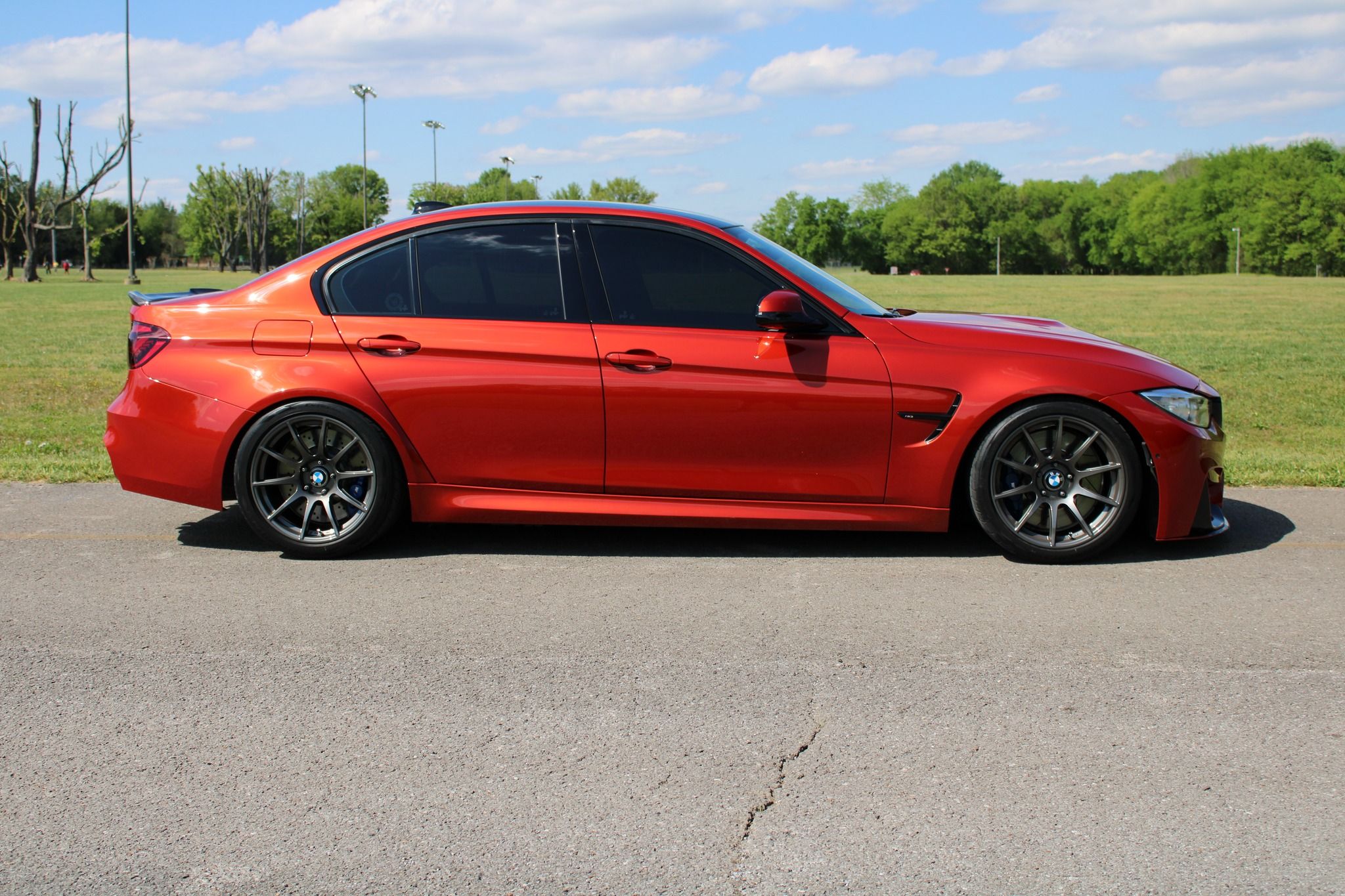 Orange BMW F80 M3 with 18" SM-10 Apex wheels in Anthracite