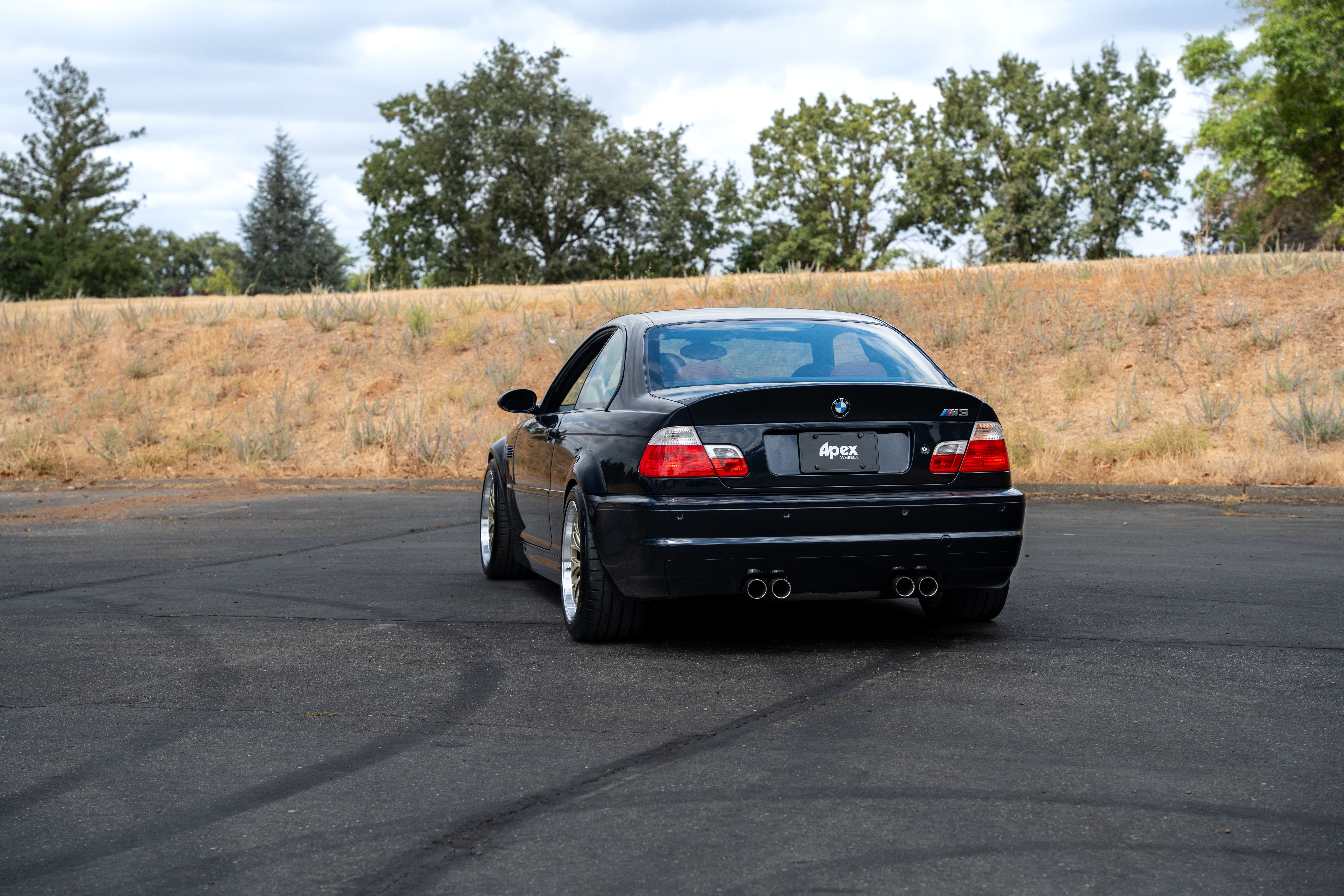 Black BMW E46 M3 with 18" ML-10RT Apex wheels in Machined Lip Gloss Motorsport Gold
