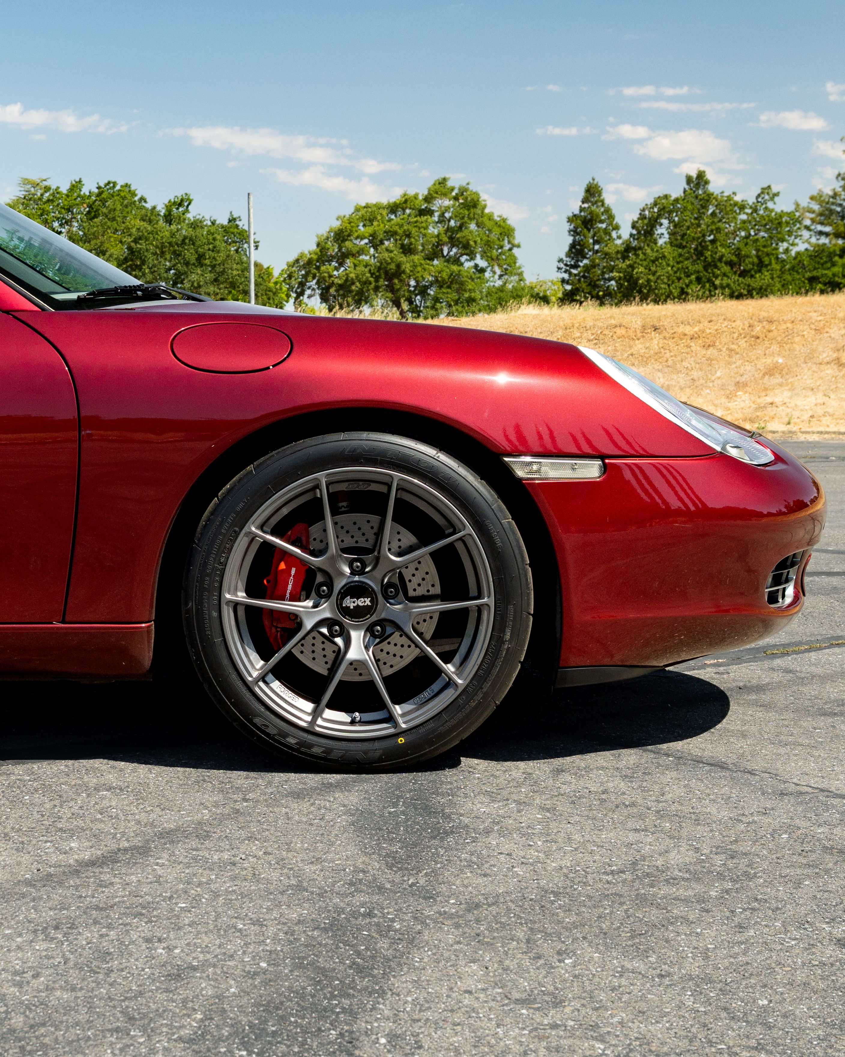 Red Porsche 986 Boxster with 18" VS-5RS Apex wheels in Anthracite