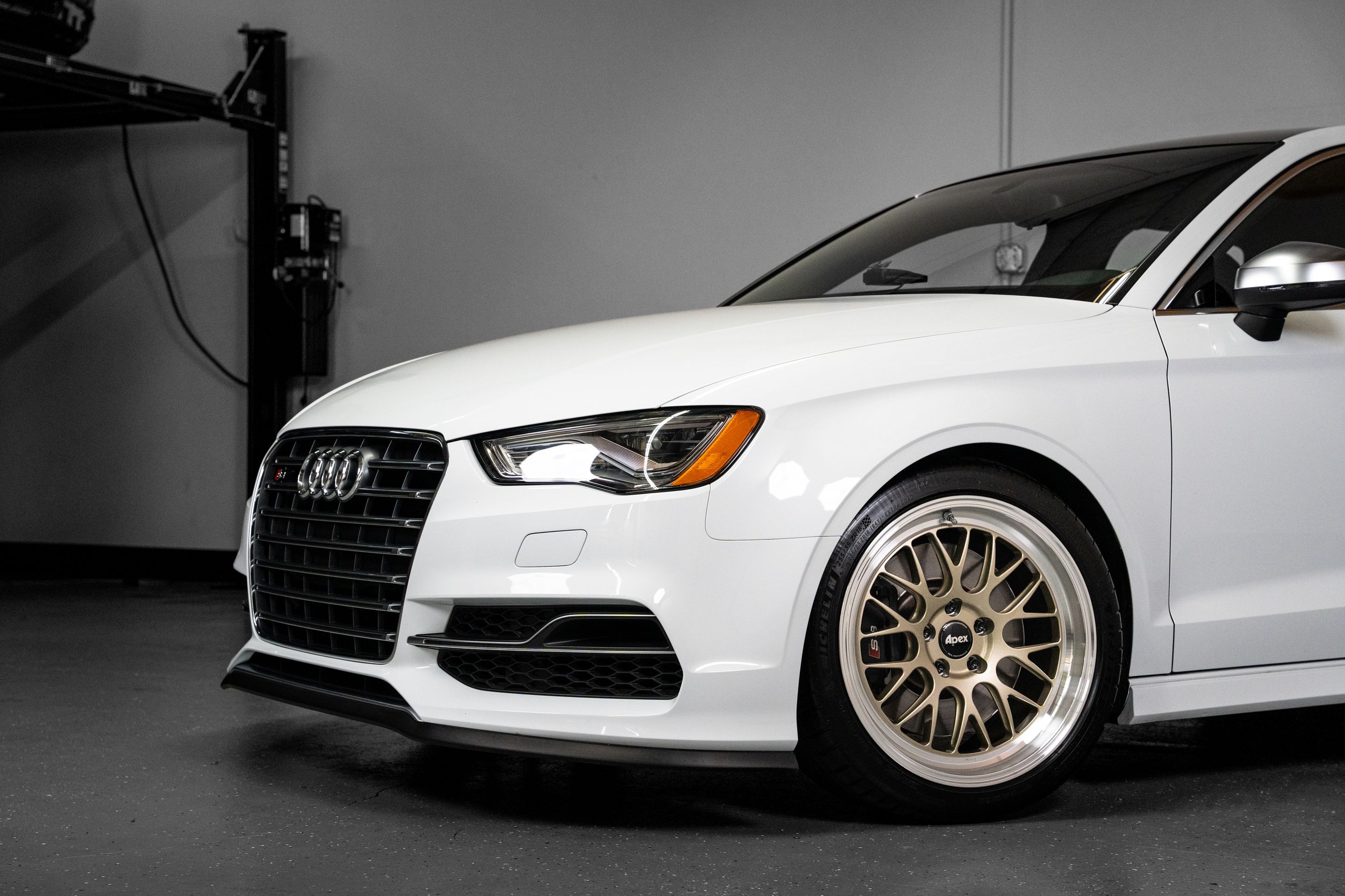 White Audi 8V S3 with 18" ML-10RT Apex wheels in Machined Lip Gloss Motorsport Gold