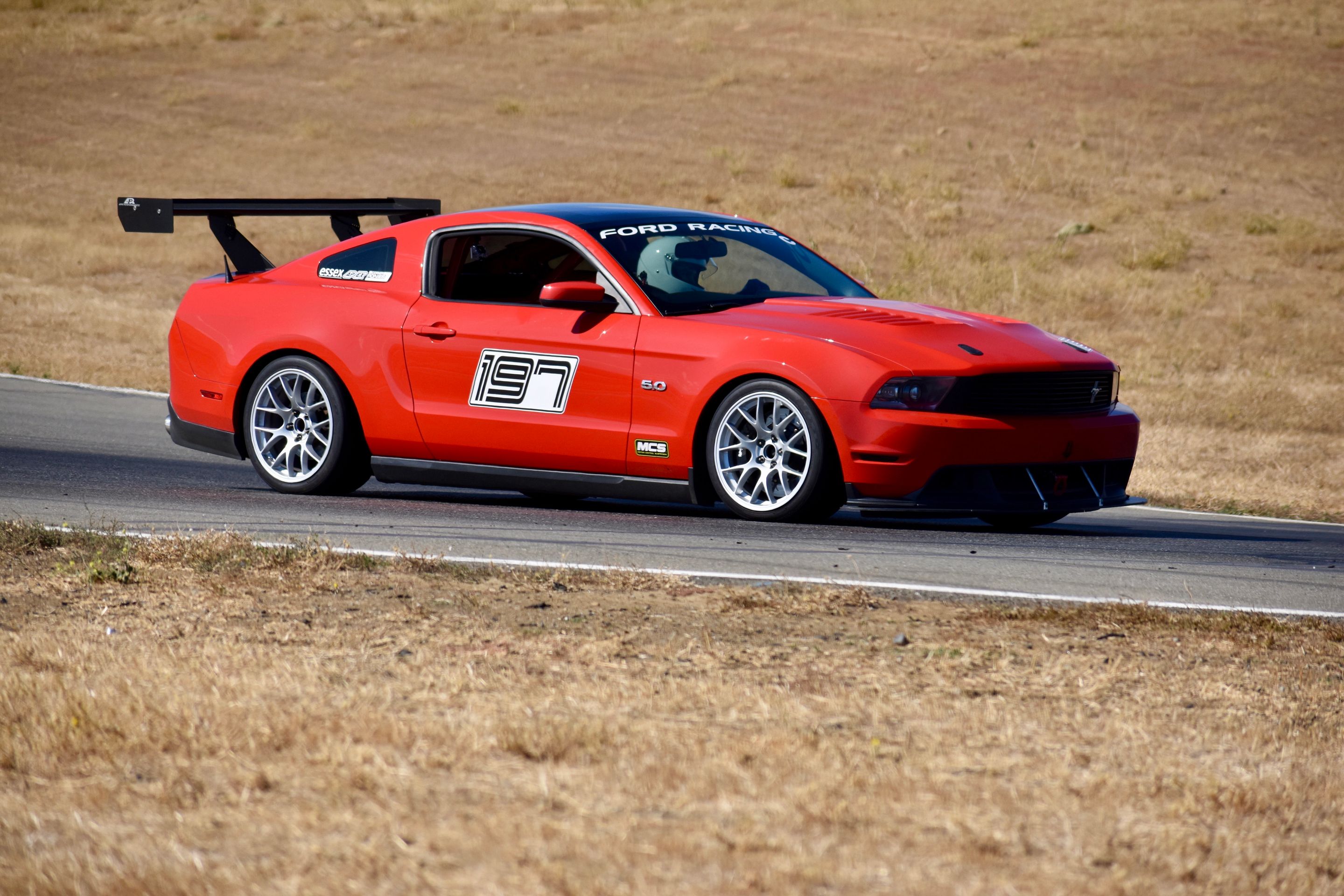 Red Ford S197 Mustang GT with 18" EC-7 Apex wheels in Race Silver