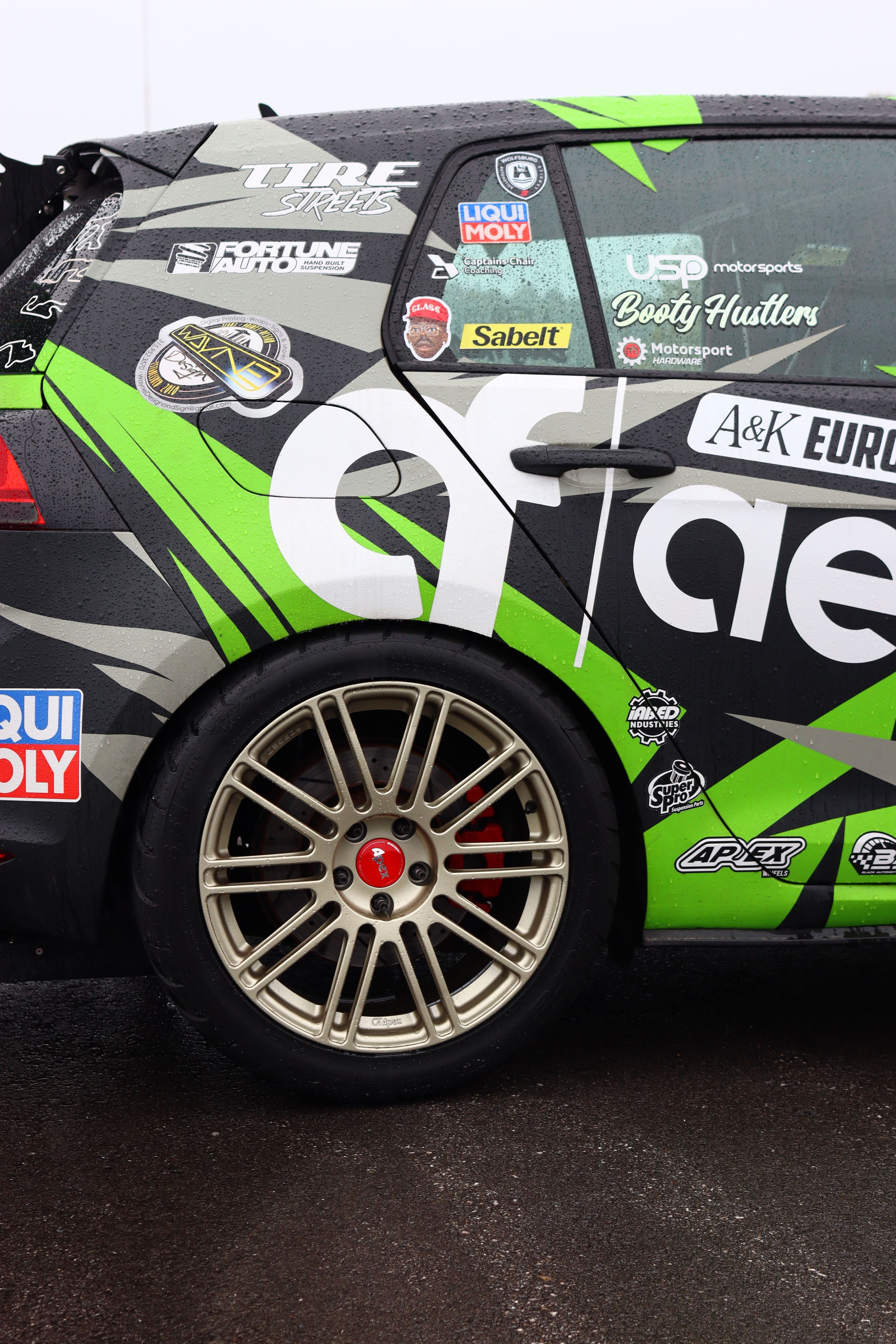 Race Livery VW MK7 GTI with 18" TC-10RT Apex wheels in Motorsport Gold