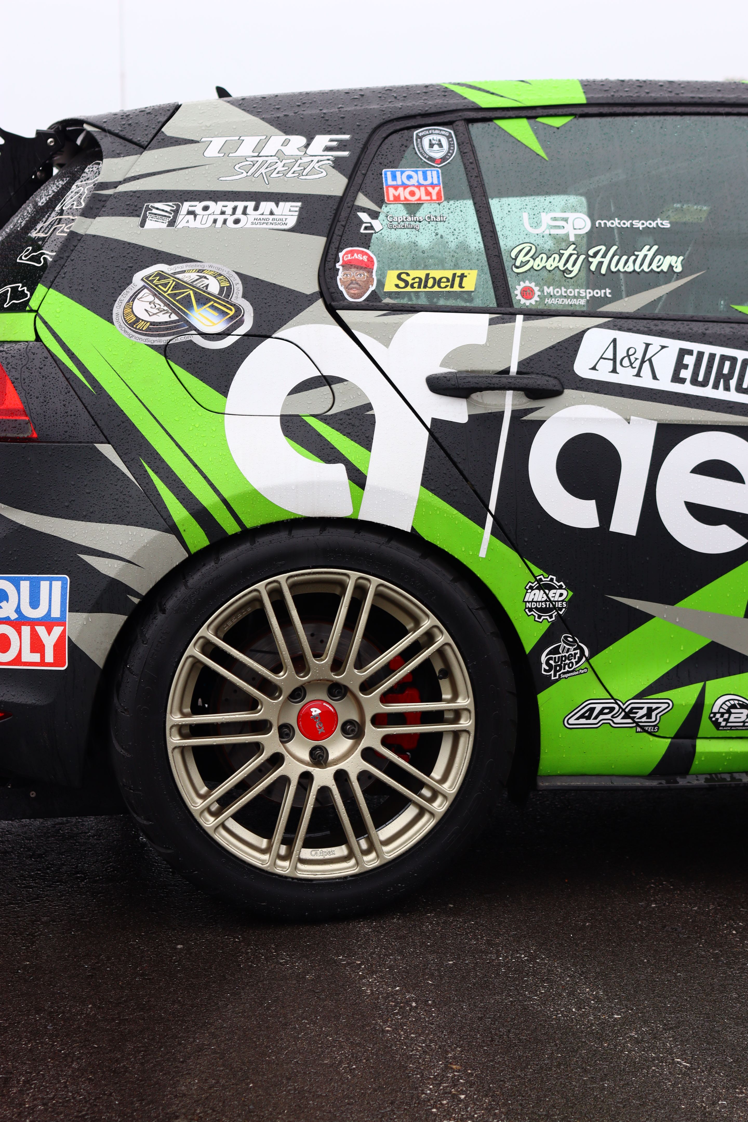 Race Livery VW MK7 GTI with 18" TC-10RT Apex wheels in Motorsport Gold