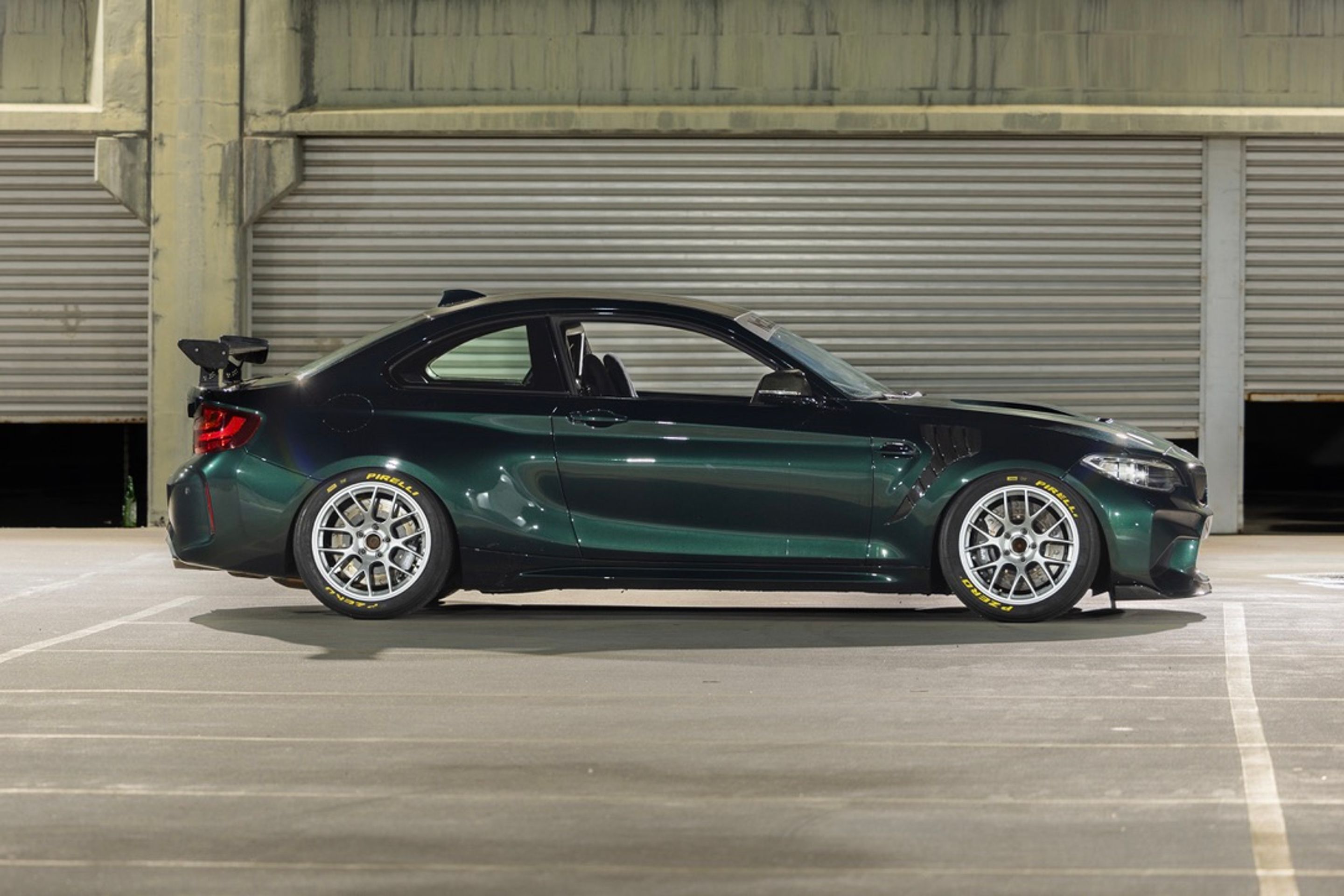 Green BMW F87 M2 with 18" EC-7 Apex wheels in Race Silver