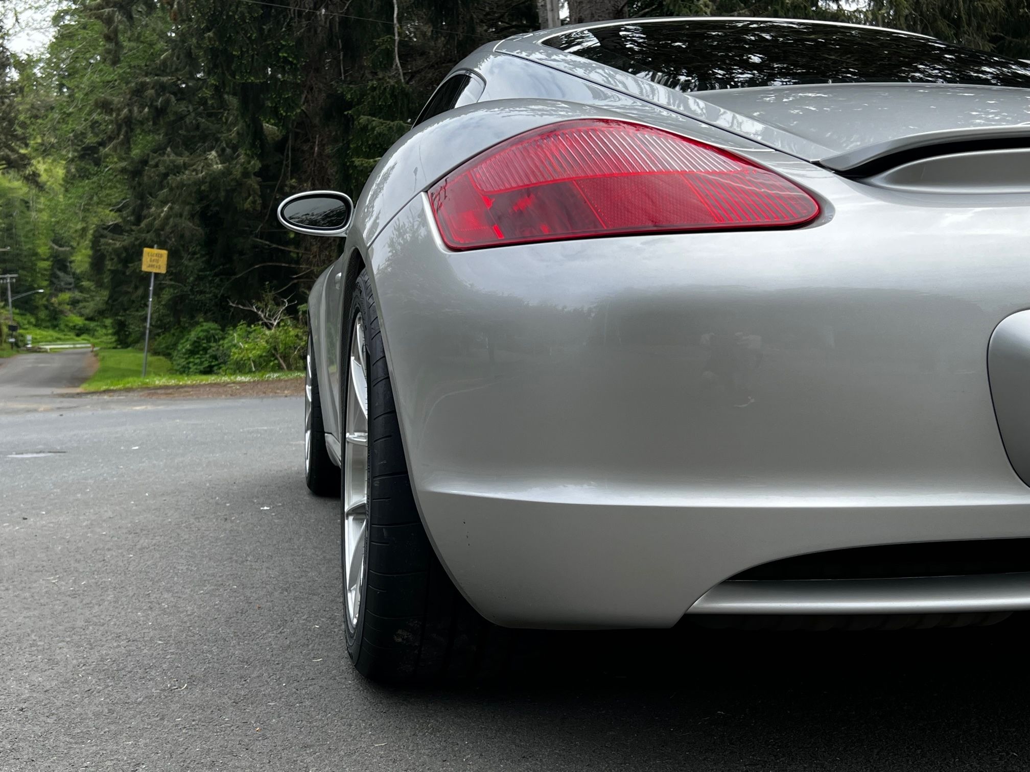 Silver Porsche 987 Cayman S with 18" VS-5RS Apex wheels in Brushed Clear