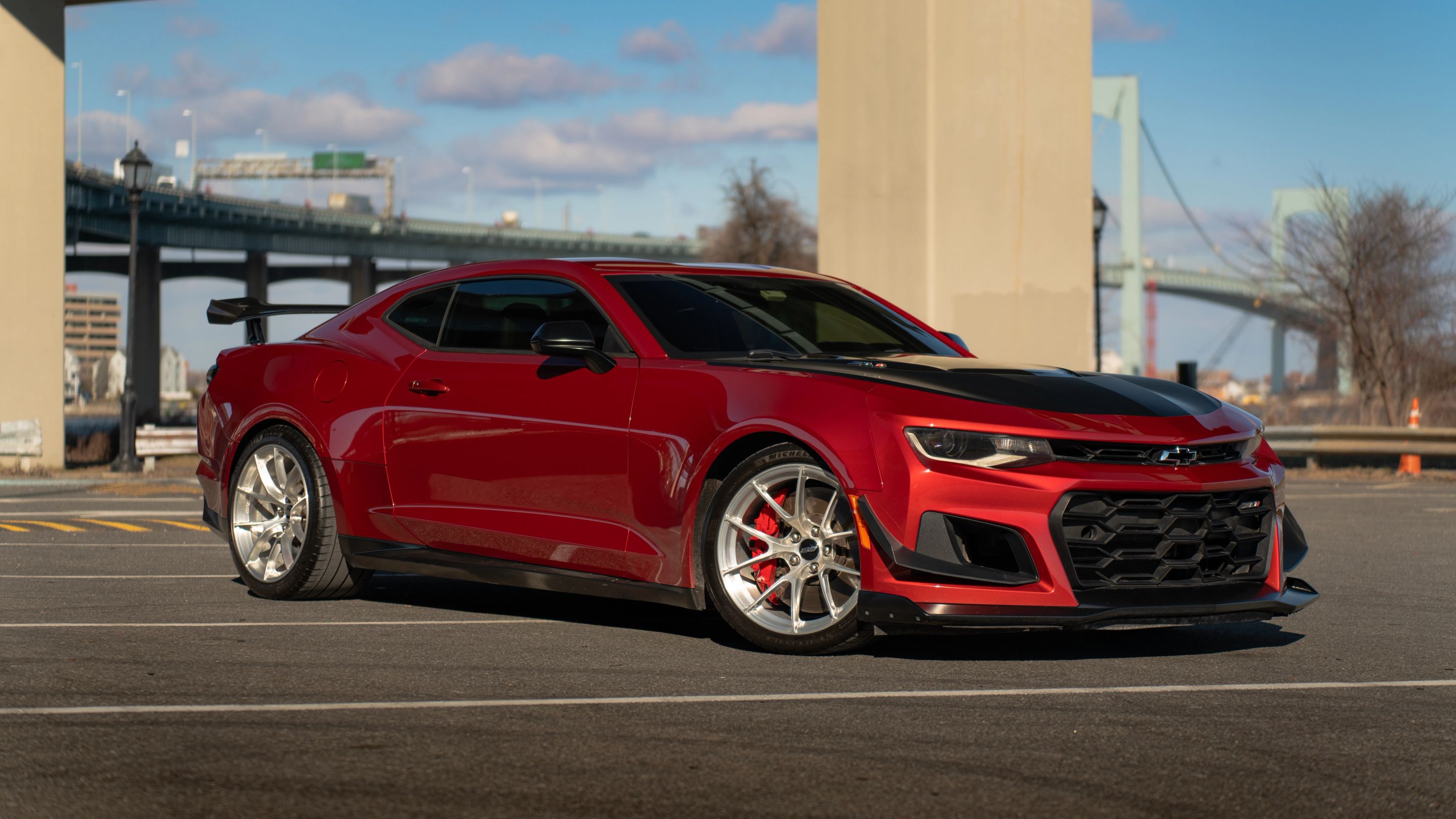 Red Chevrolet 6th Gen Camaro ZL1 with 19" VS-5RS Apex wheels in Brushed Clear