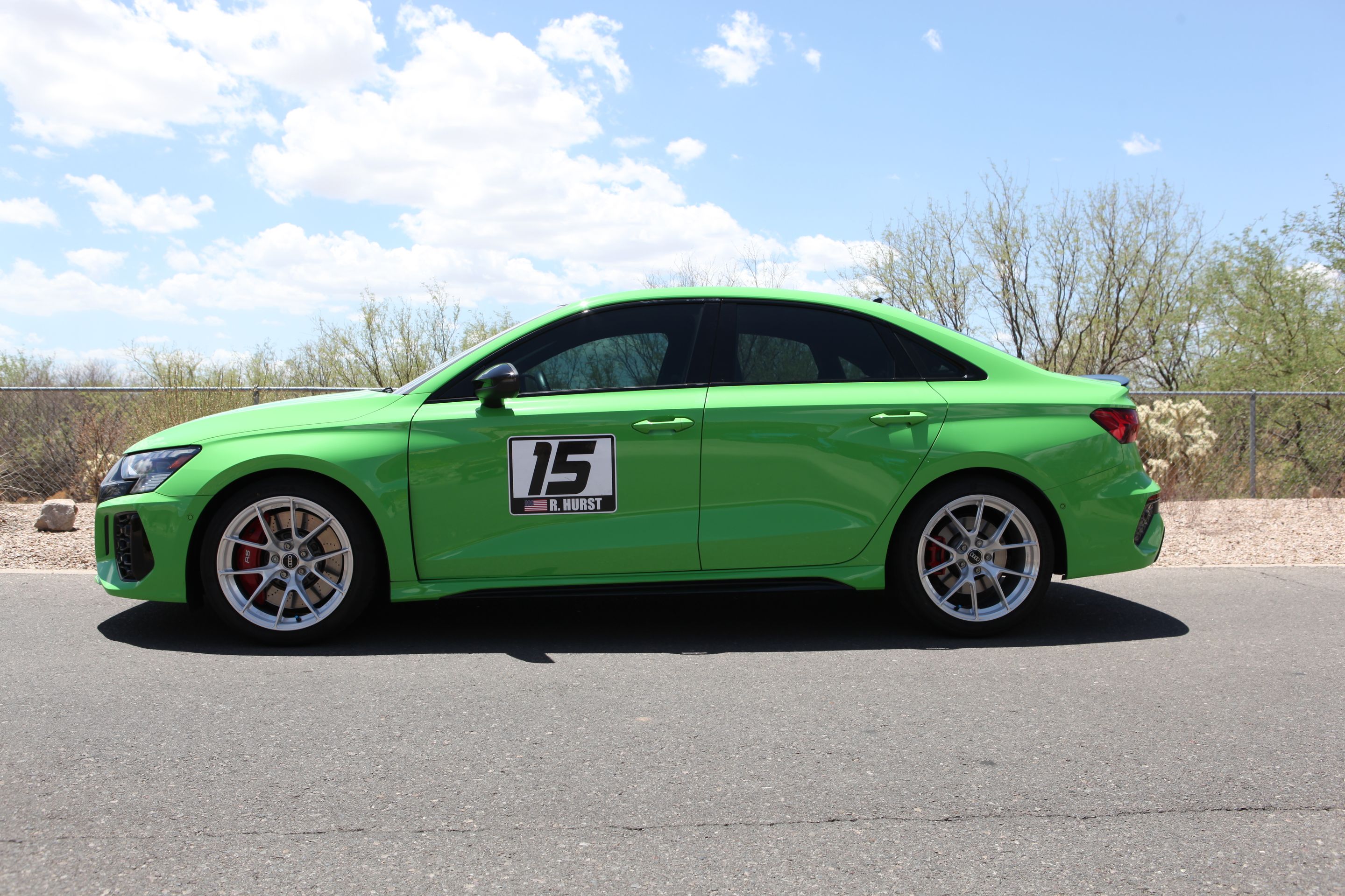 Green Audi 8Y RS 3 with 18" VS-5RS Apex wheels in Brushed Clear